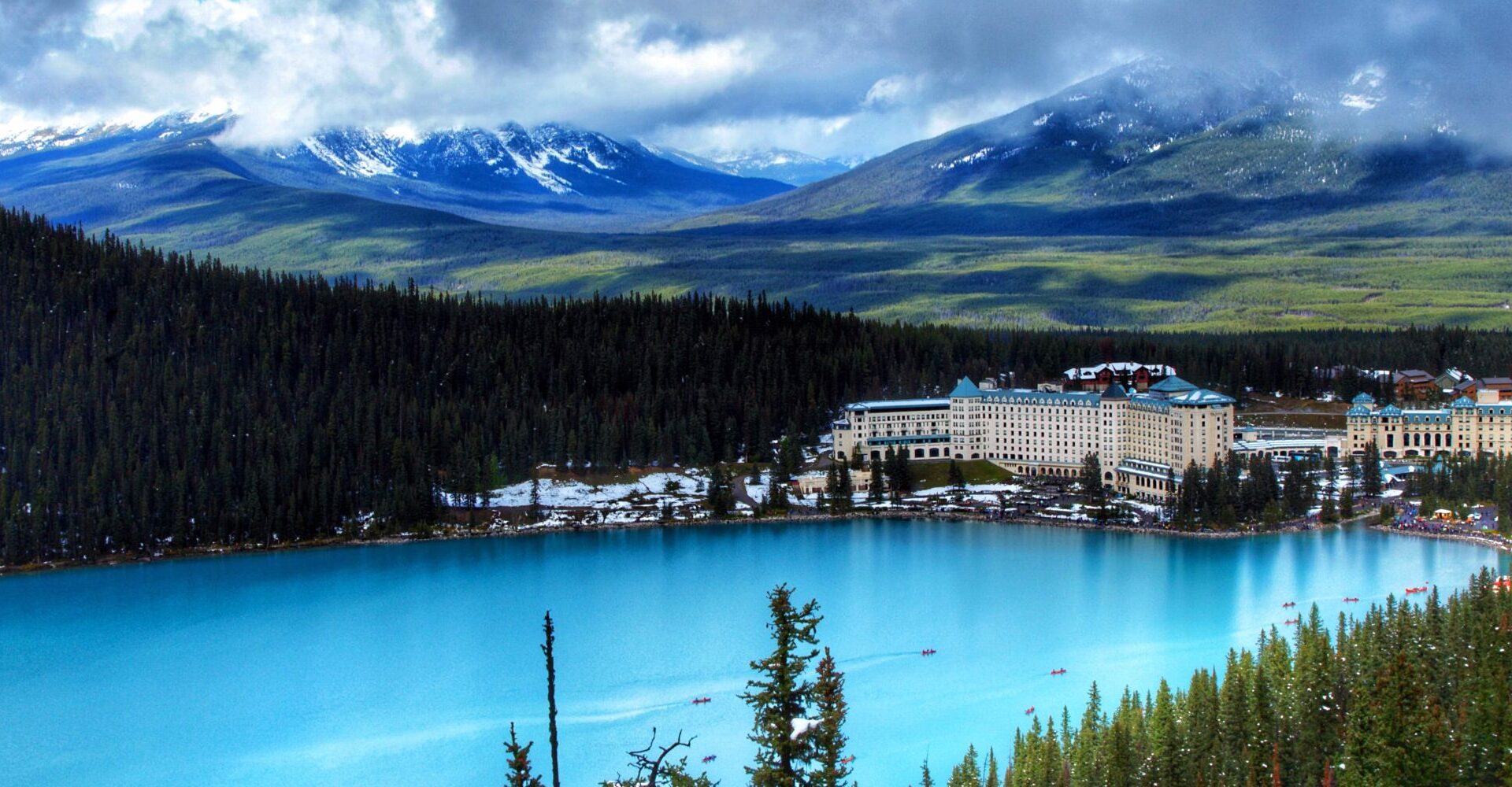 a large building next to a lake