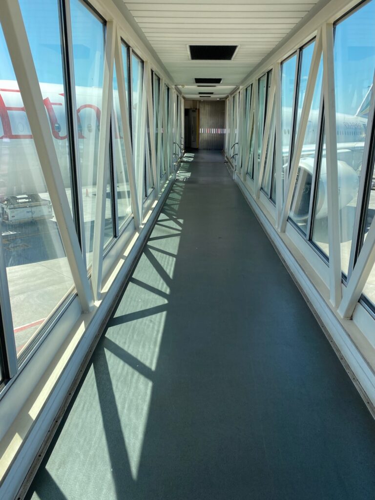 a long hallway with windows