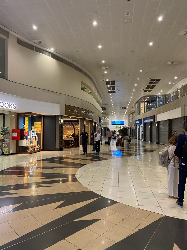 a group of people in a shopping mall