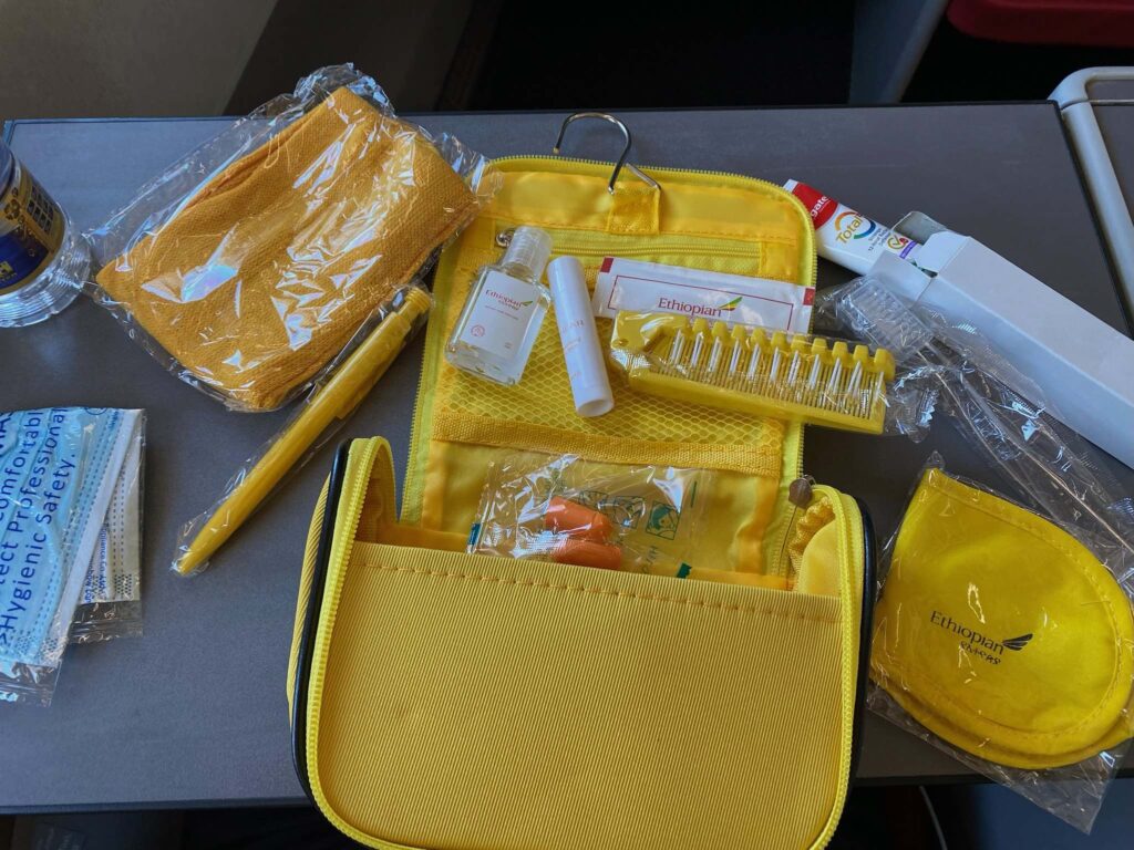 a yellow bag with items in it
