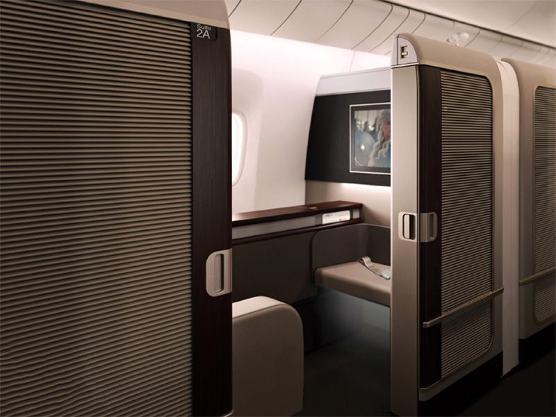 an airplane cabin with a door open