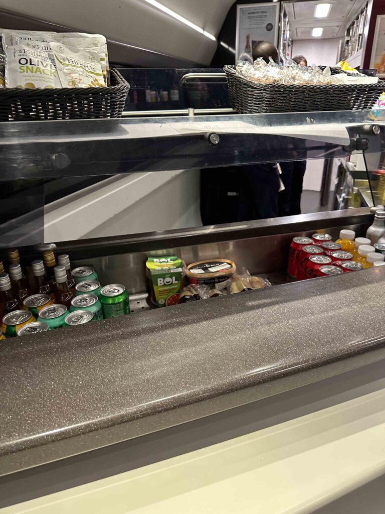 a counter with drinks and beverages