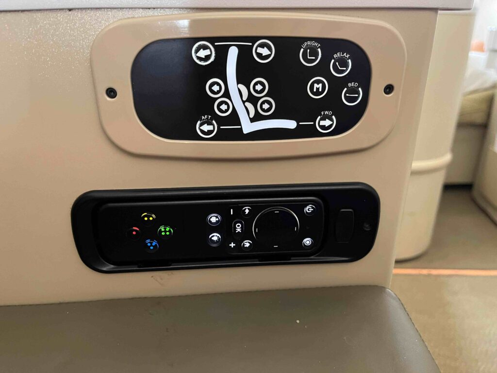 a control panel on a seat