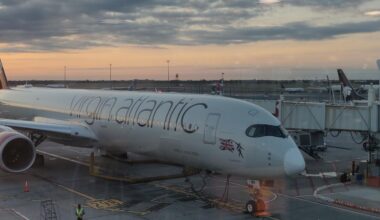 a large white airplane on a runway