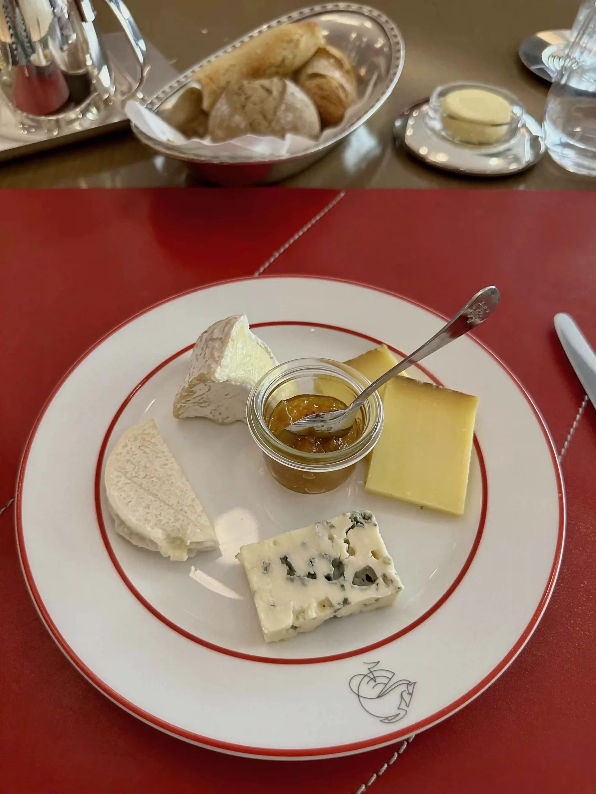 a plate of cheese and jam