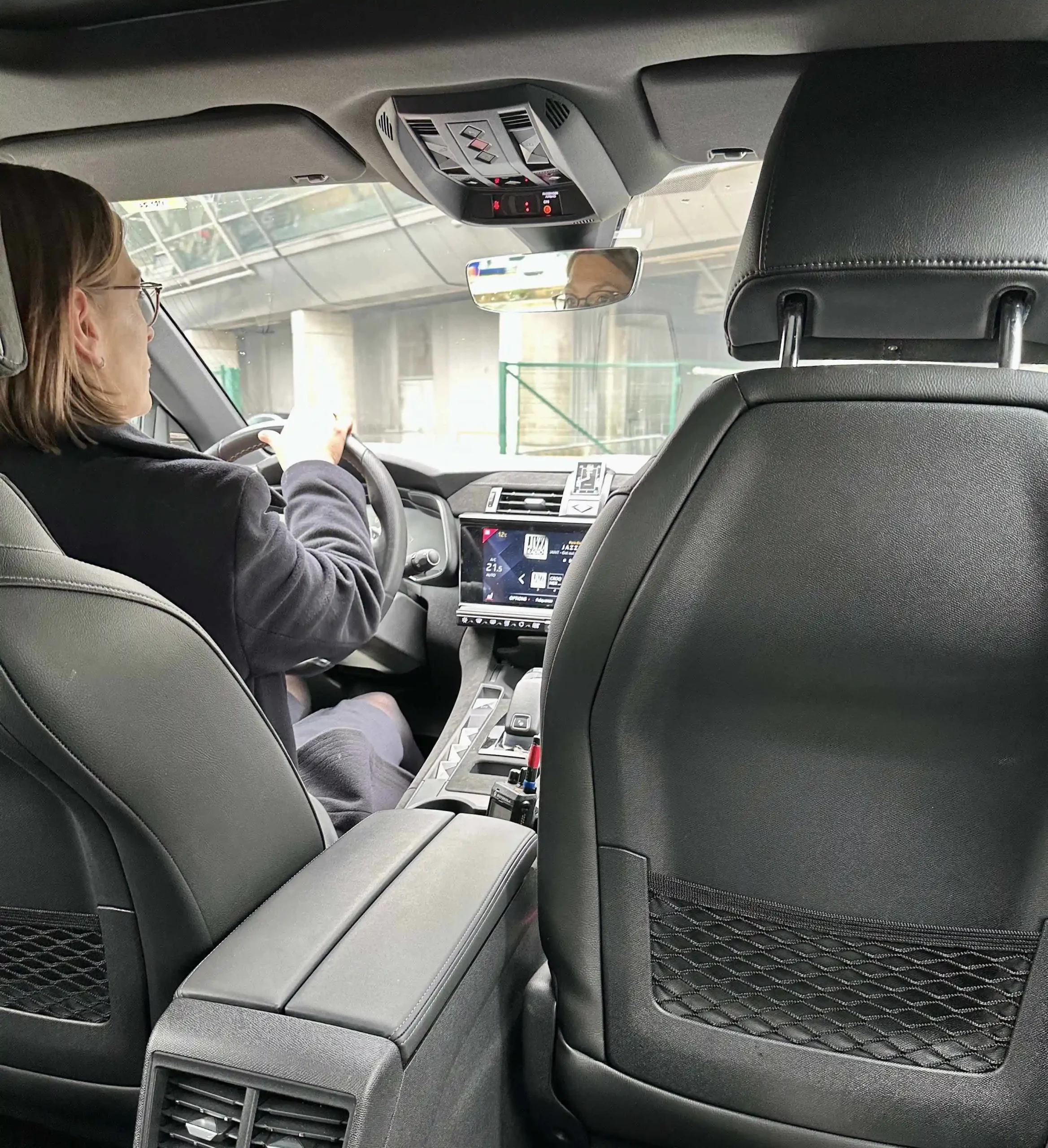 a woman driving a car