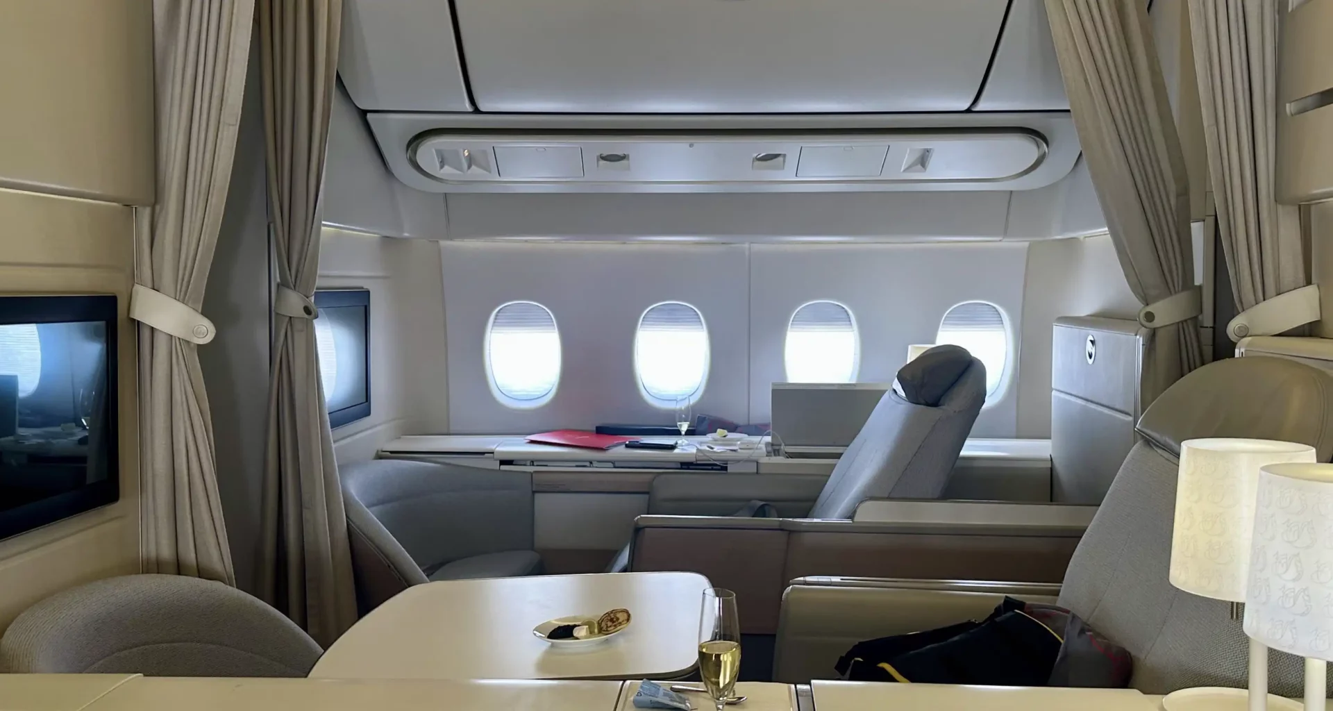 a table with food on it in an airplane