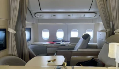 a table with food on it in an airplane