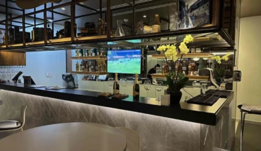 a bar with a television on the counter