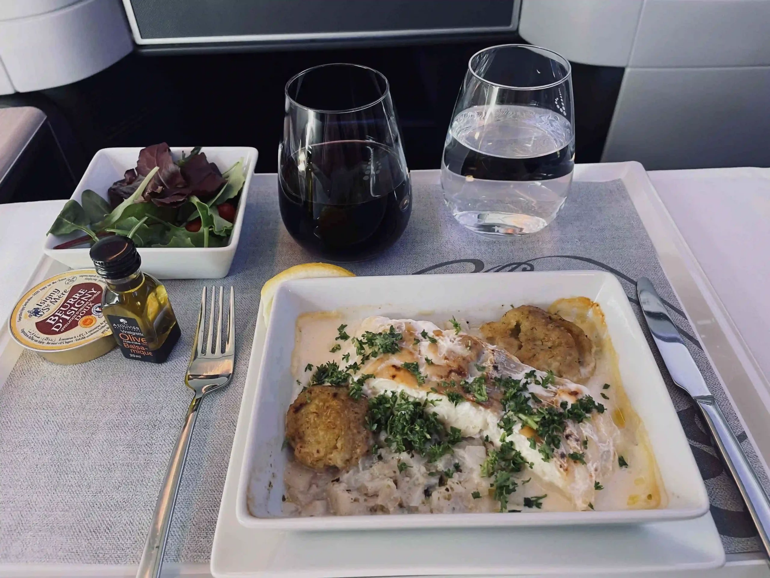 a plate of food on a tray