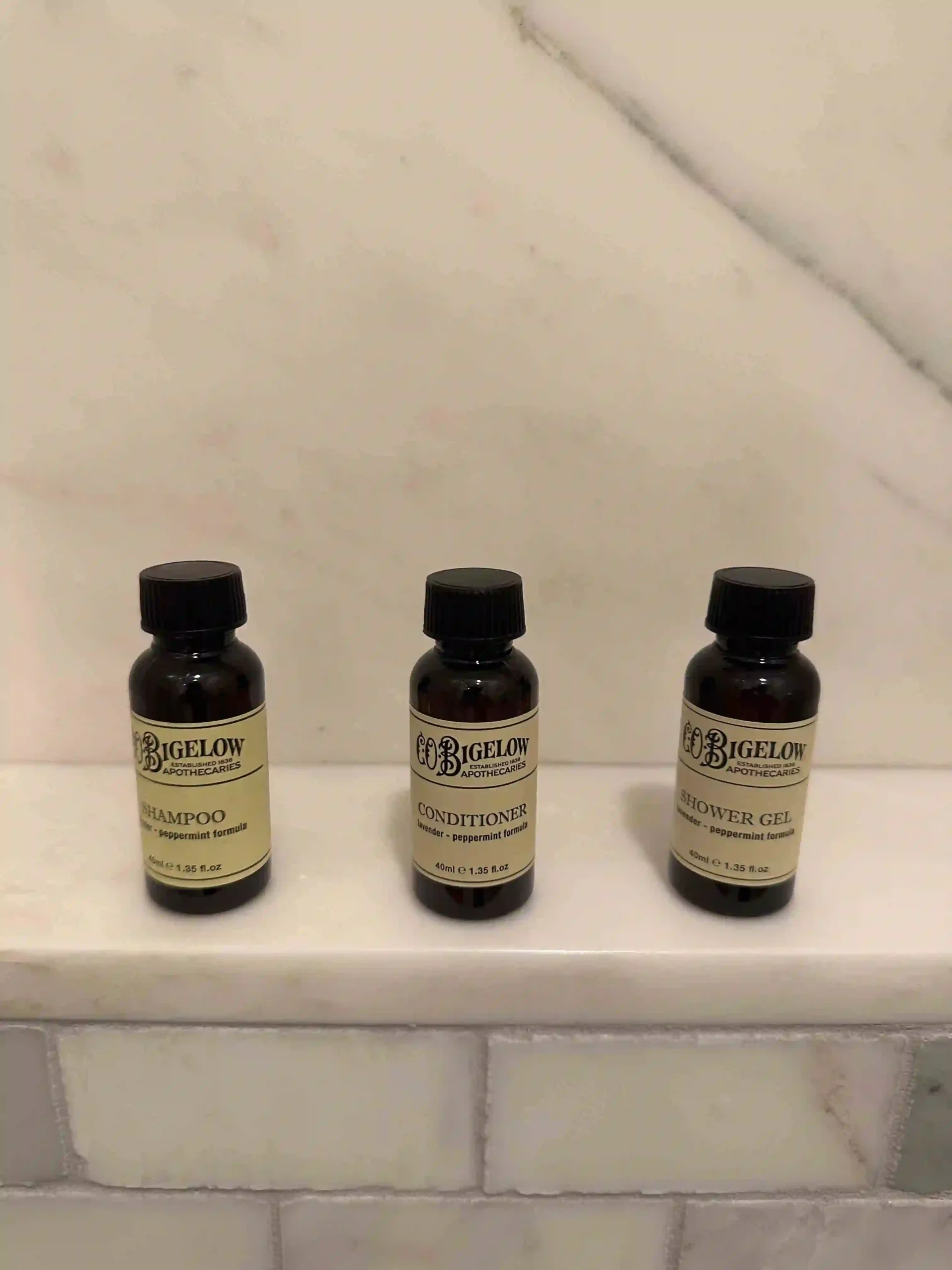 a group of small bottles on a counter