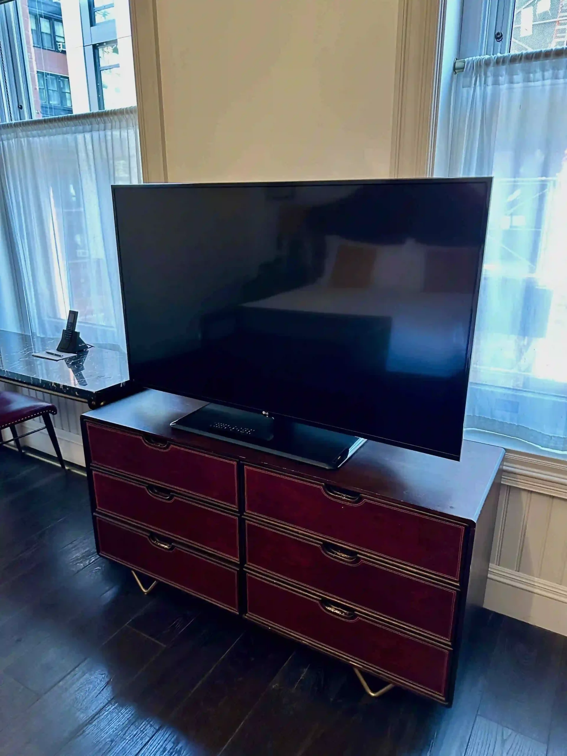 a tv on a dresser