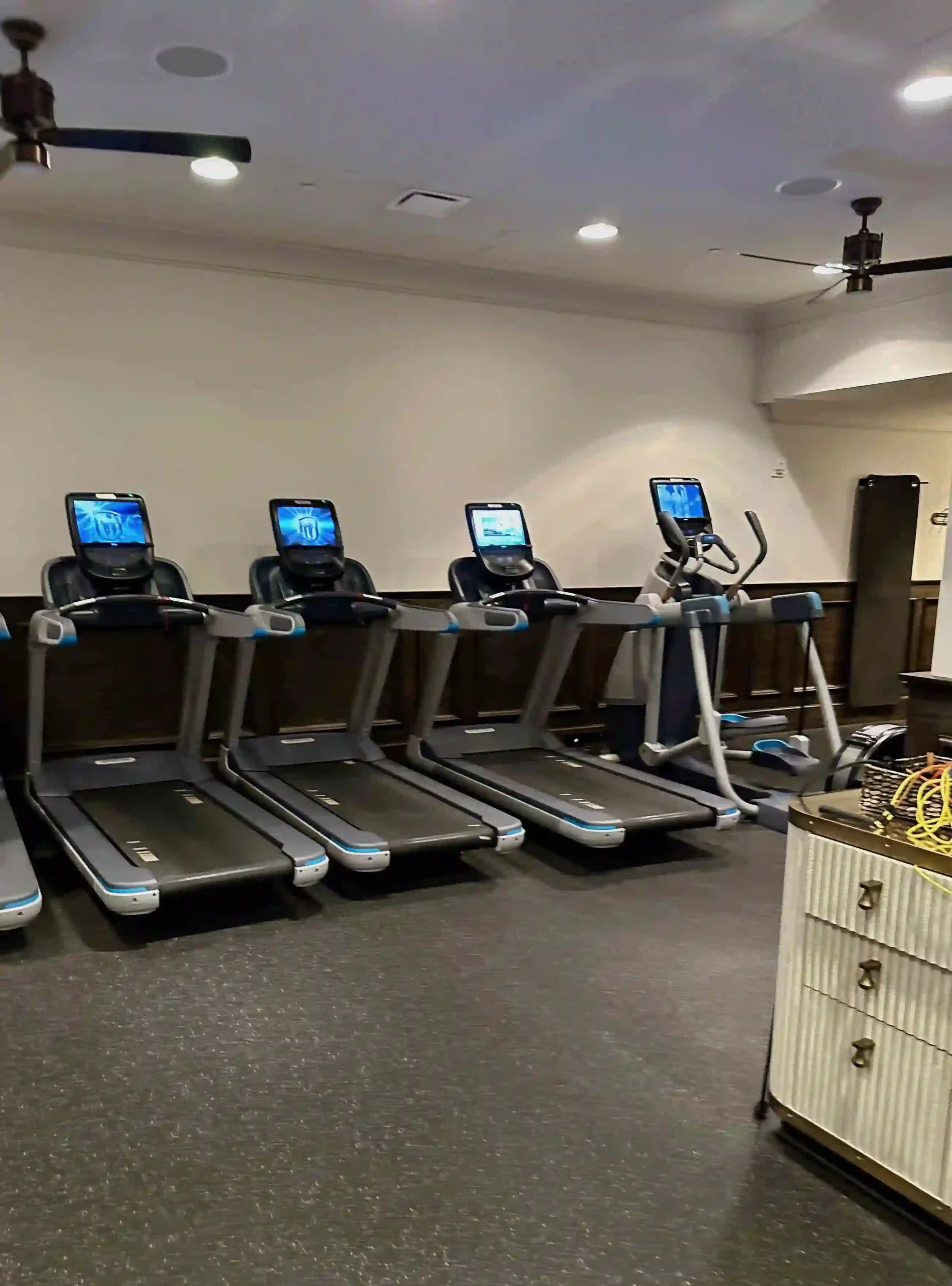 a group of treadmills in a room