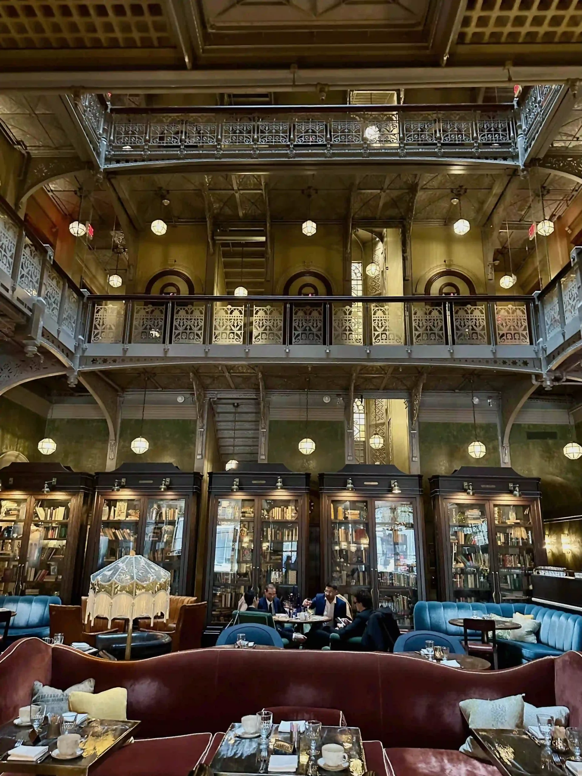 a room with a large ceiling and a large balcony