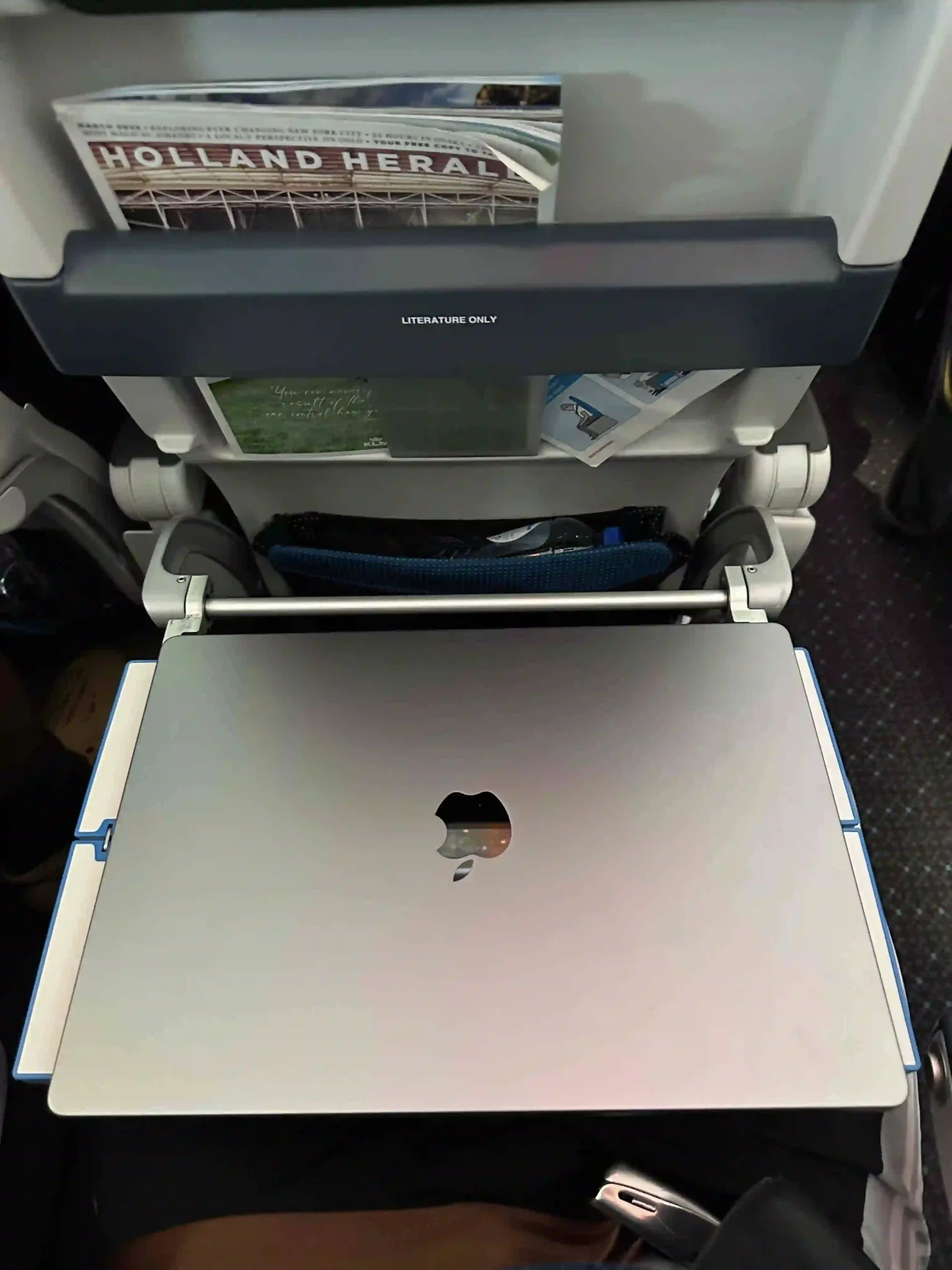 a laptop on an airplane