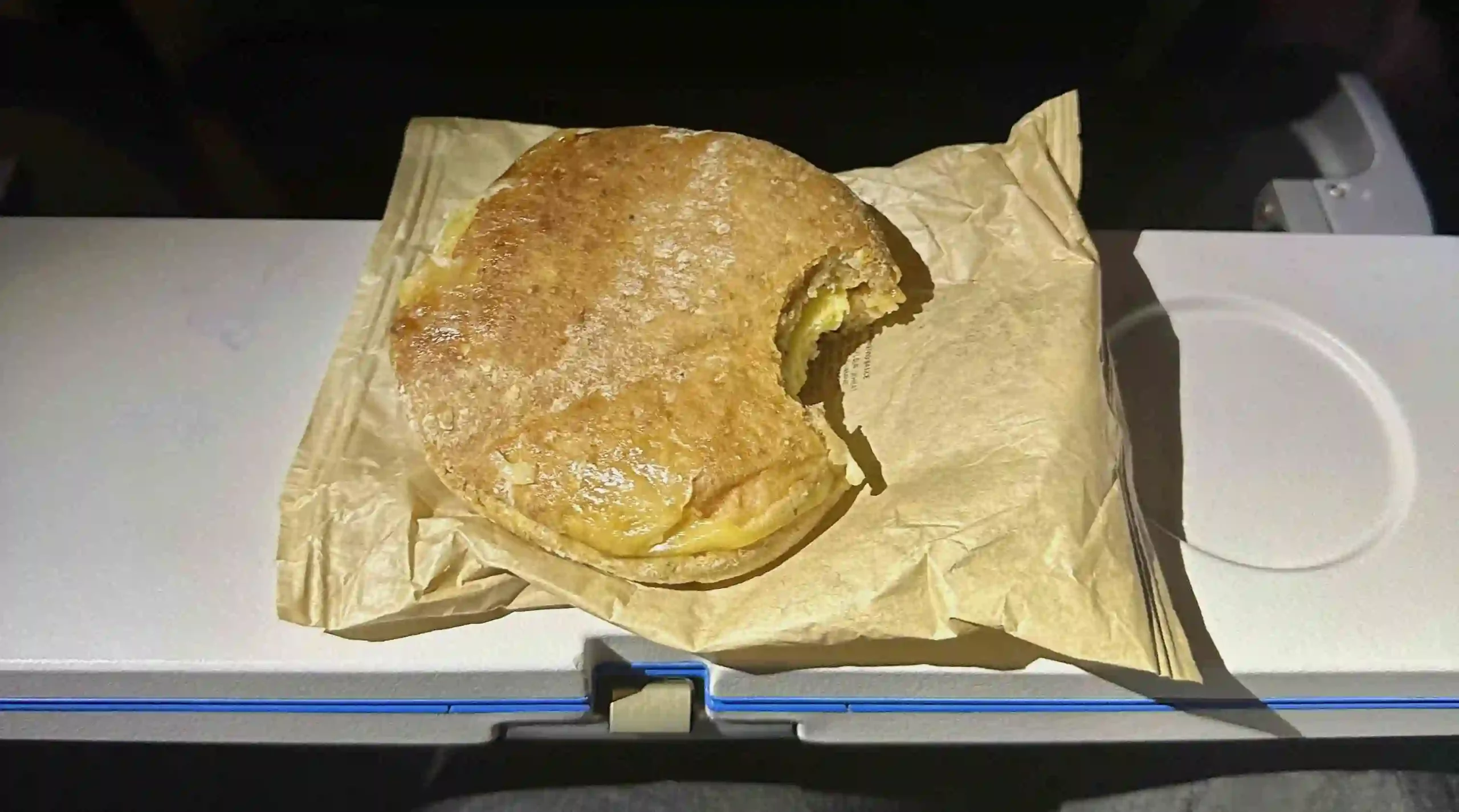 a sandwich with a bite taken out of it
