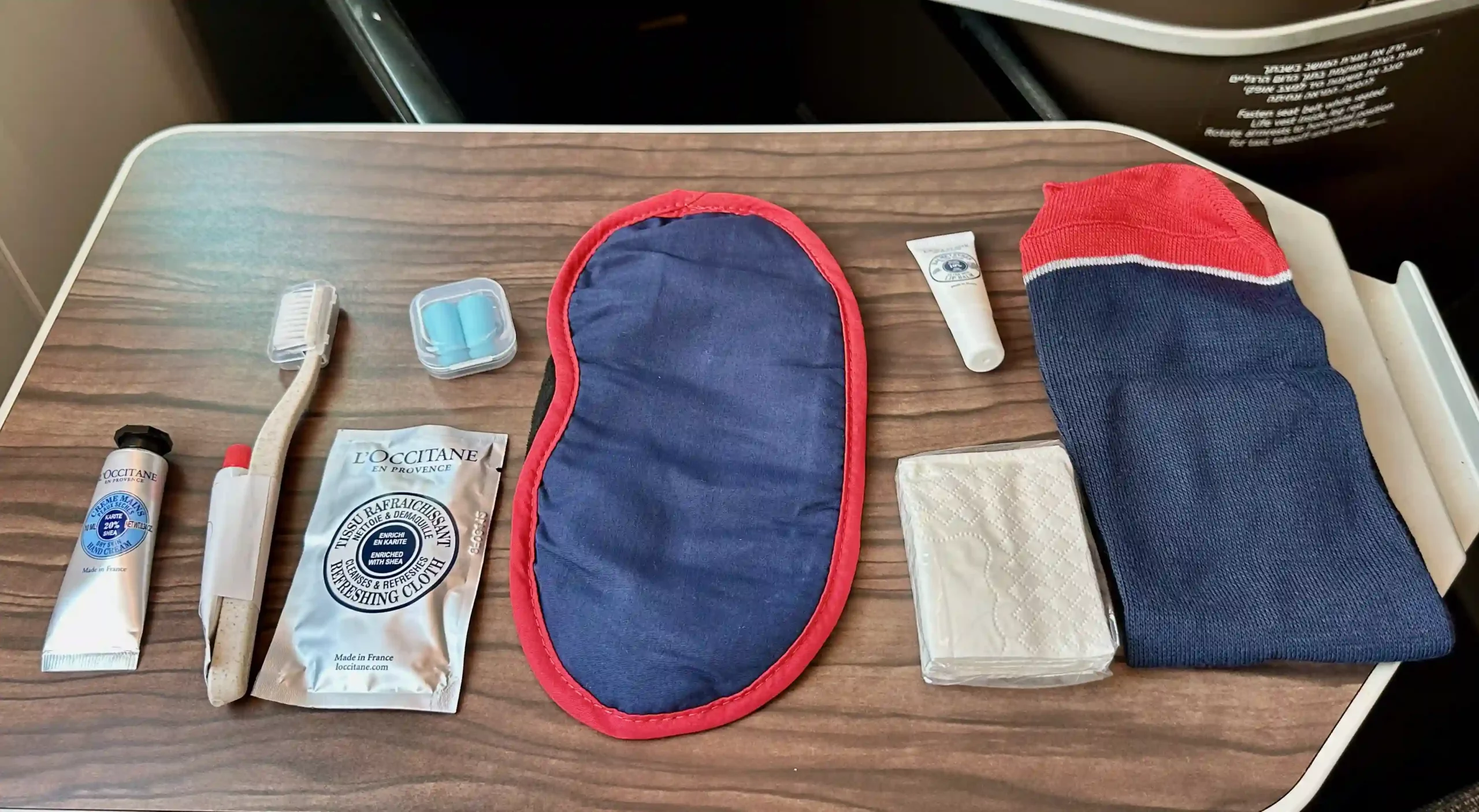 a sleeping bag and other items on a table