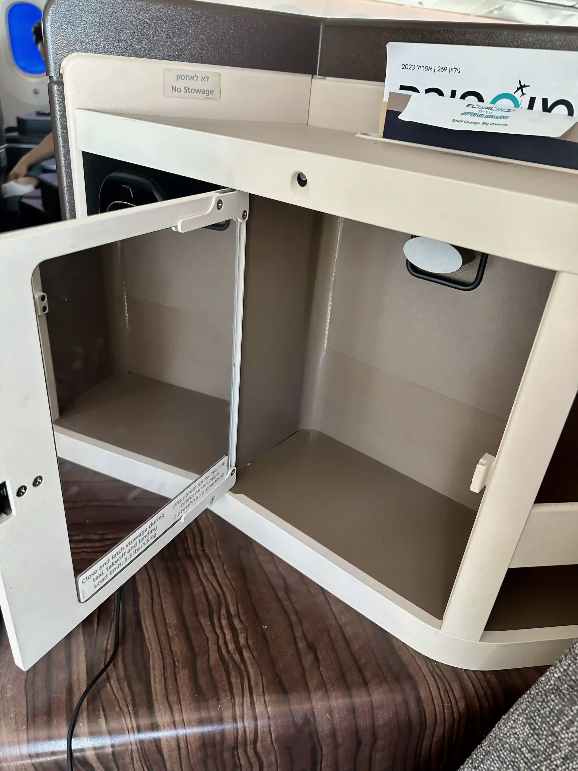 a white cabinet with a glass door