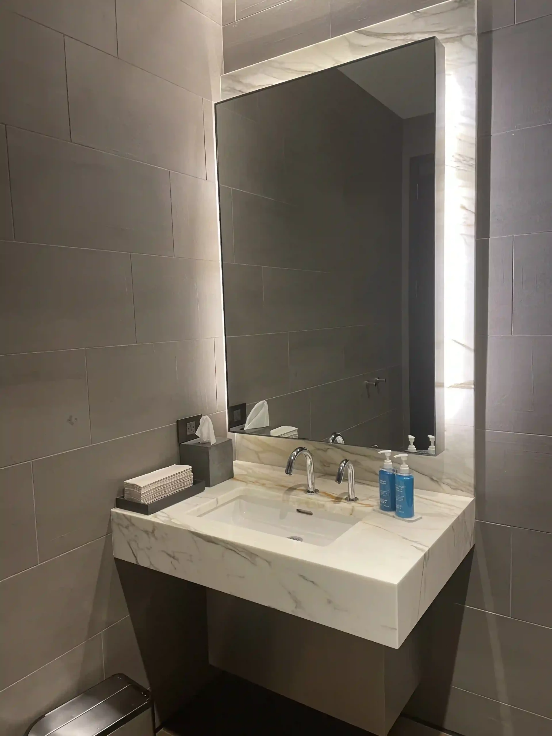 a bathroom sink with a mirror