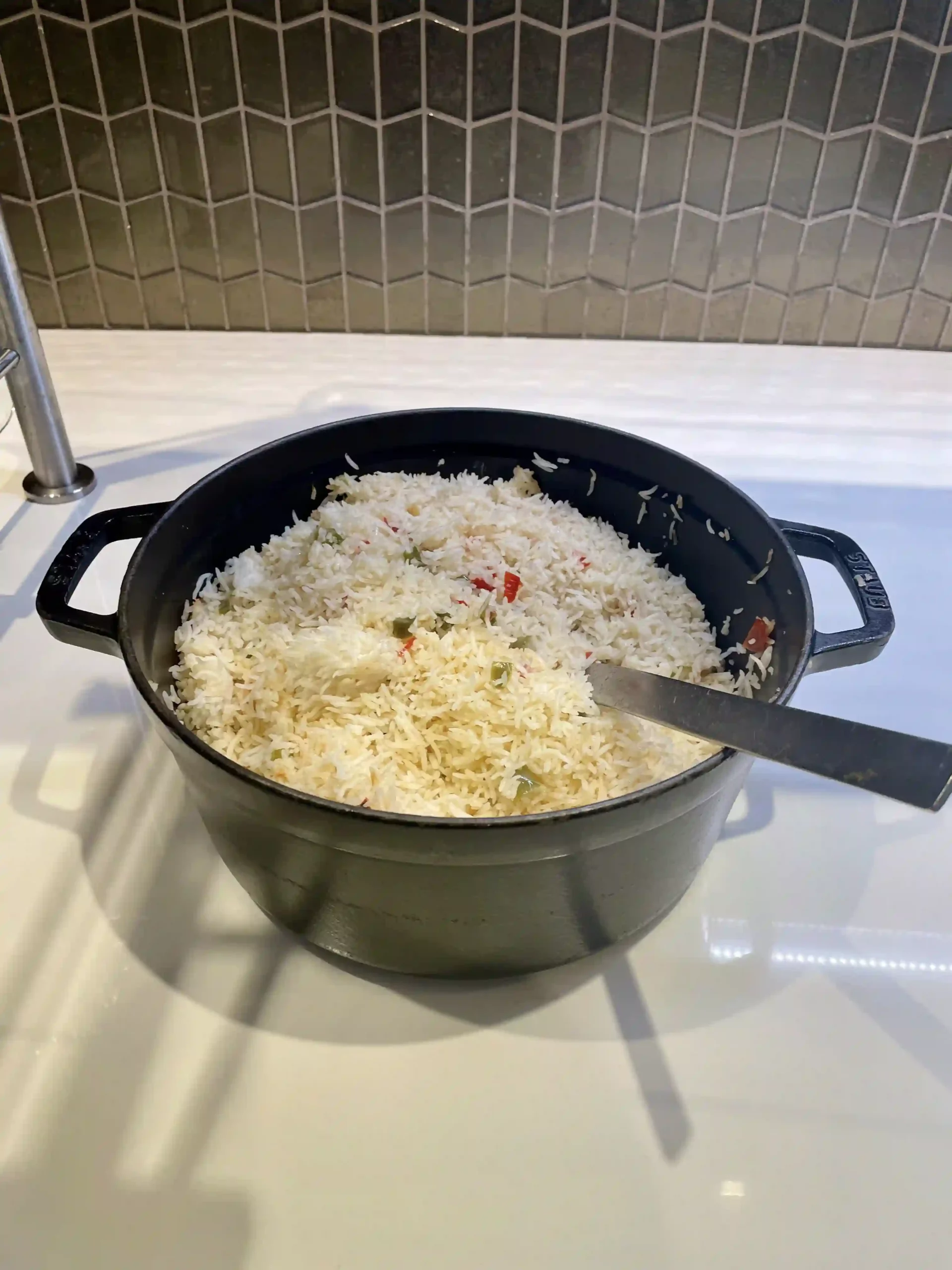 a pot of rice and vegetables