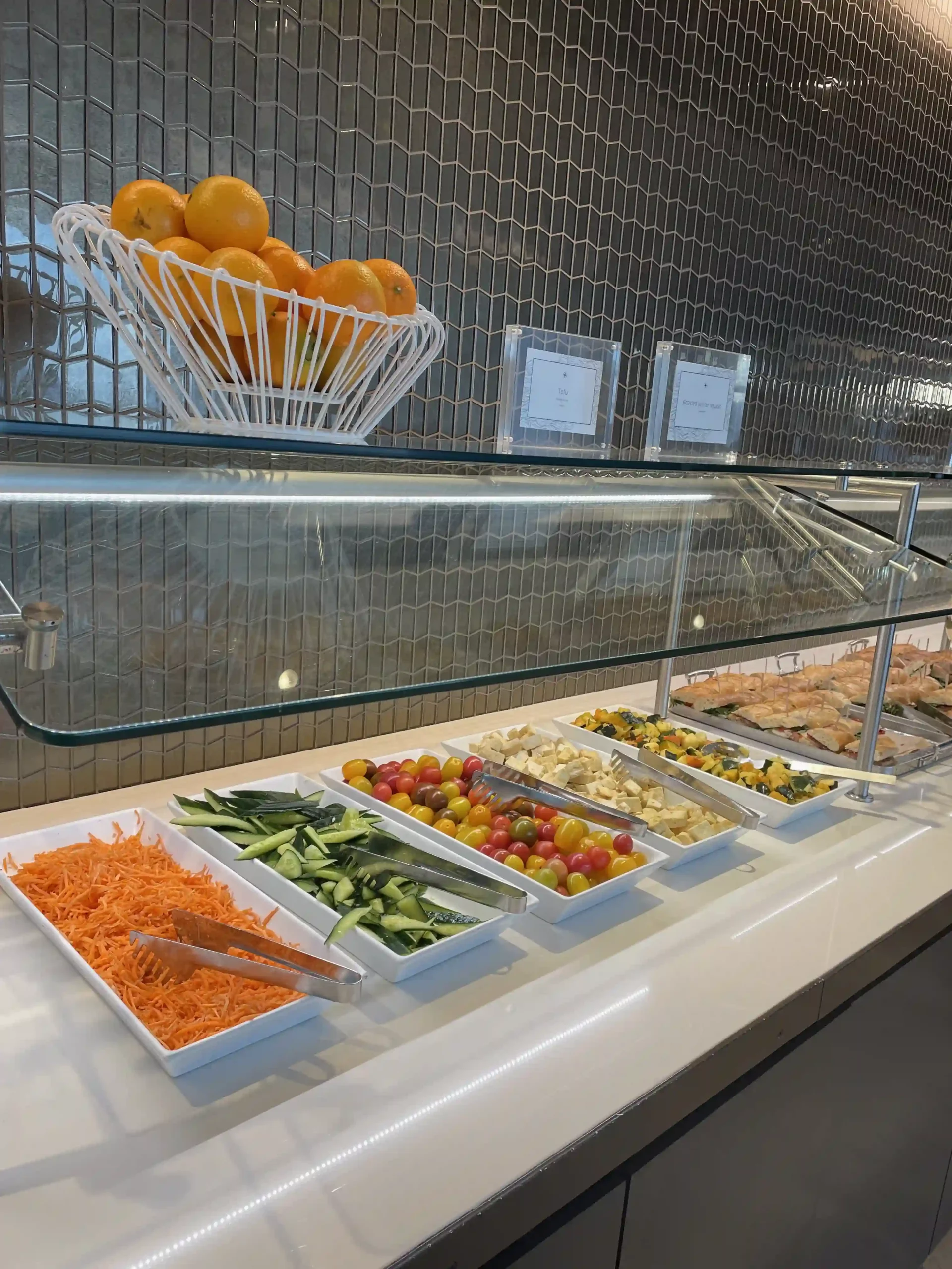 a buffet with food in containers