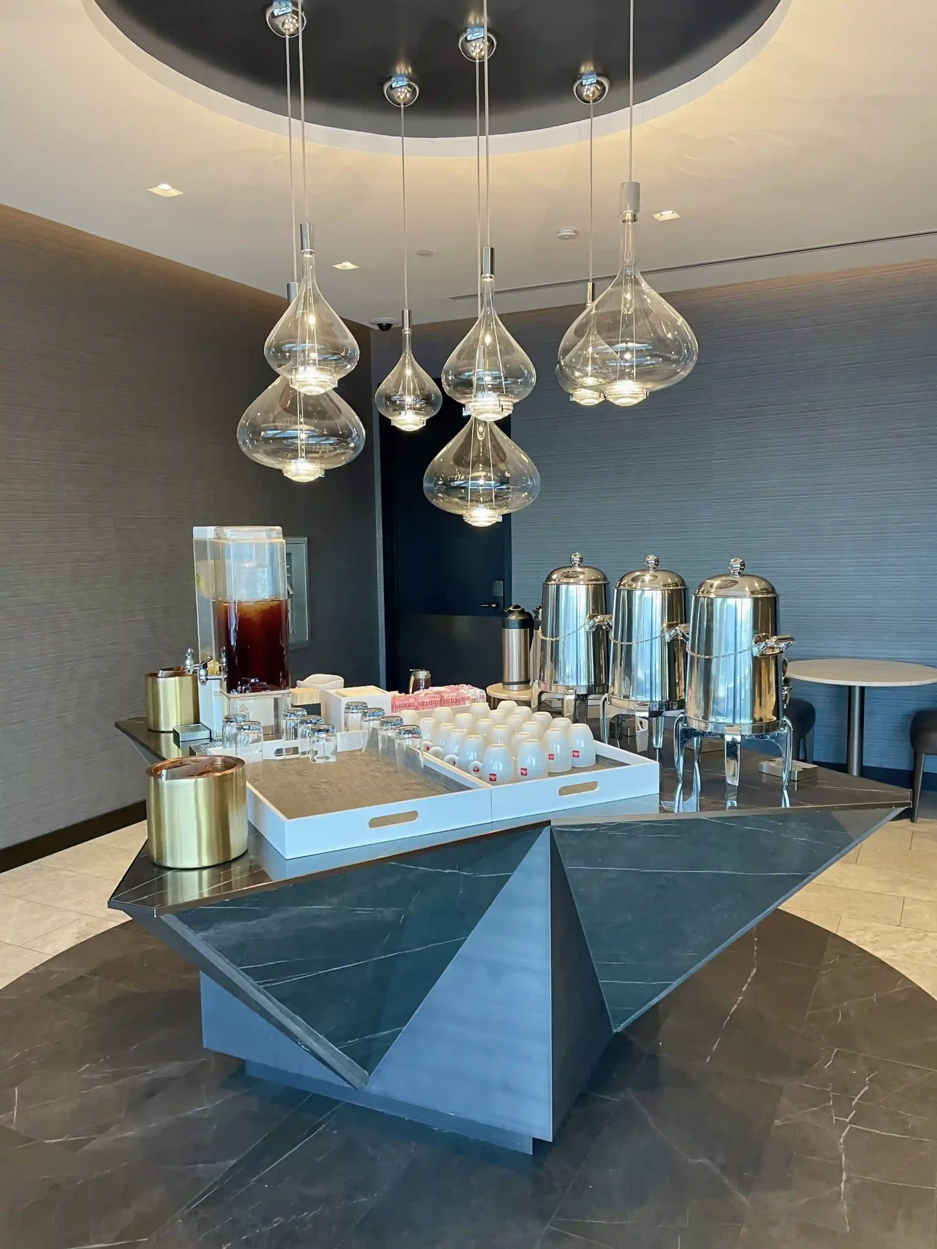 a table with a tray of food and drinks