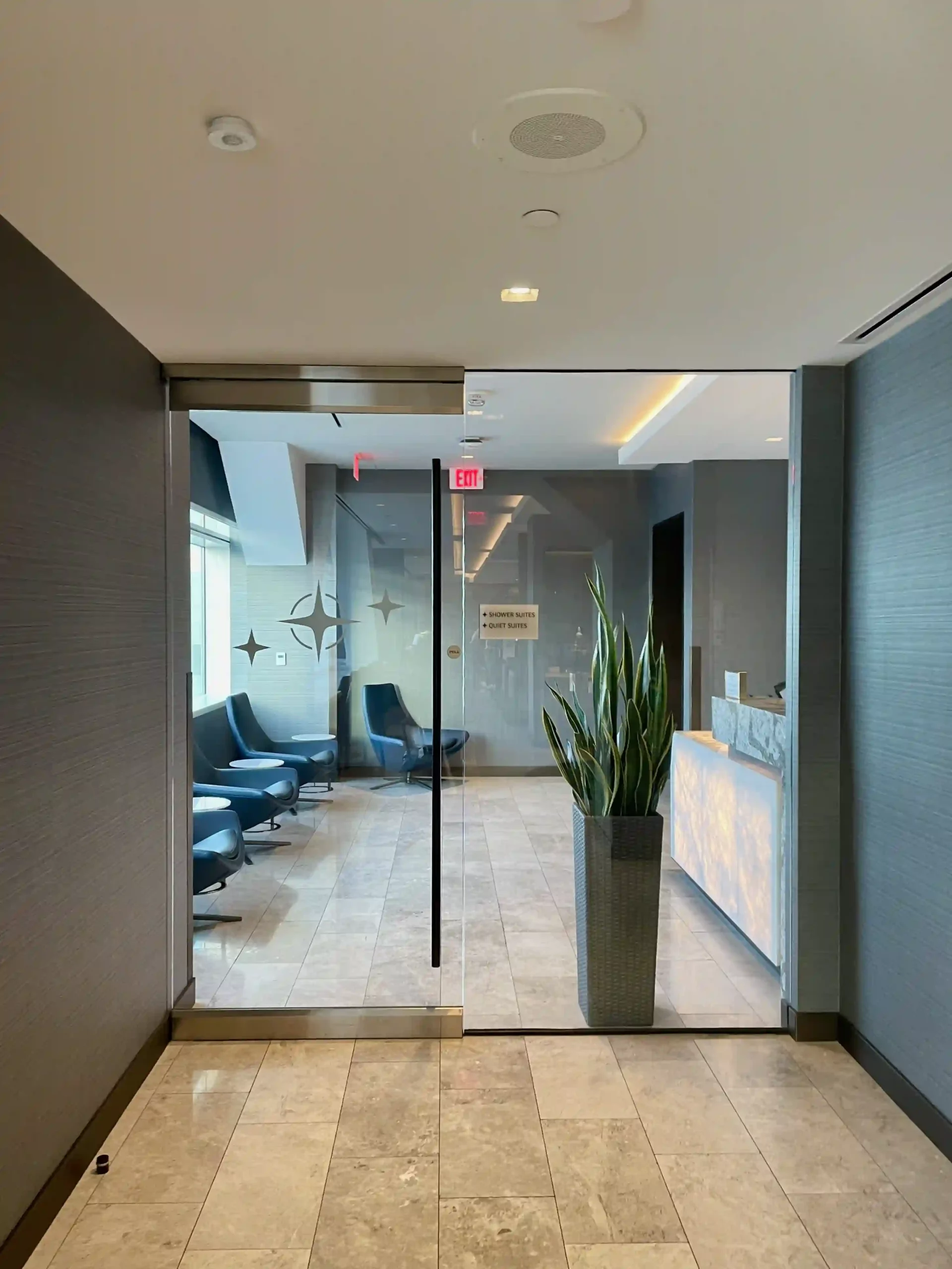 a glass door in a lobby