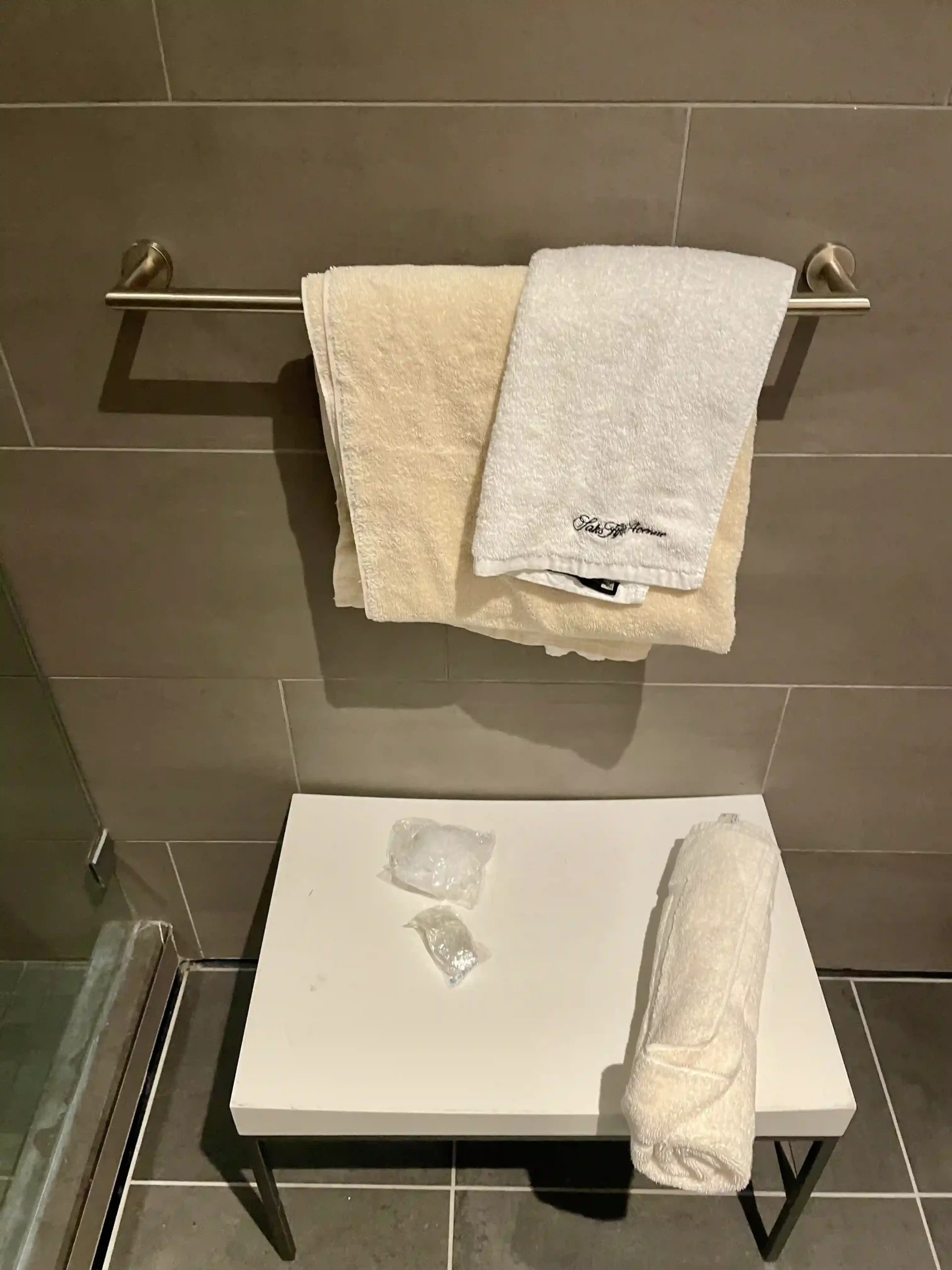 a towel rack with towels on it