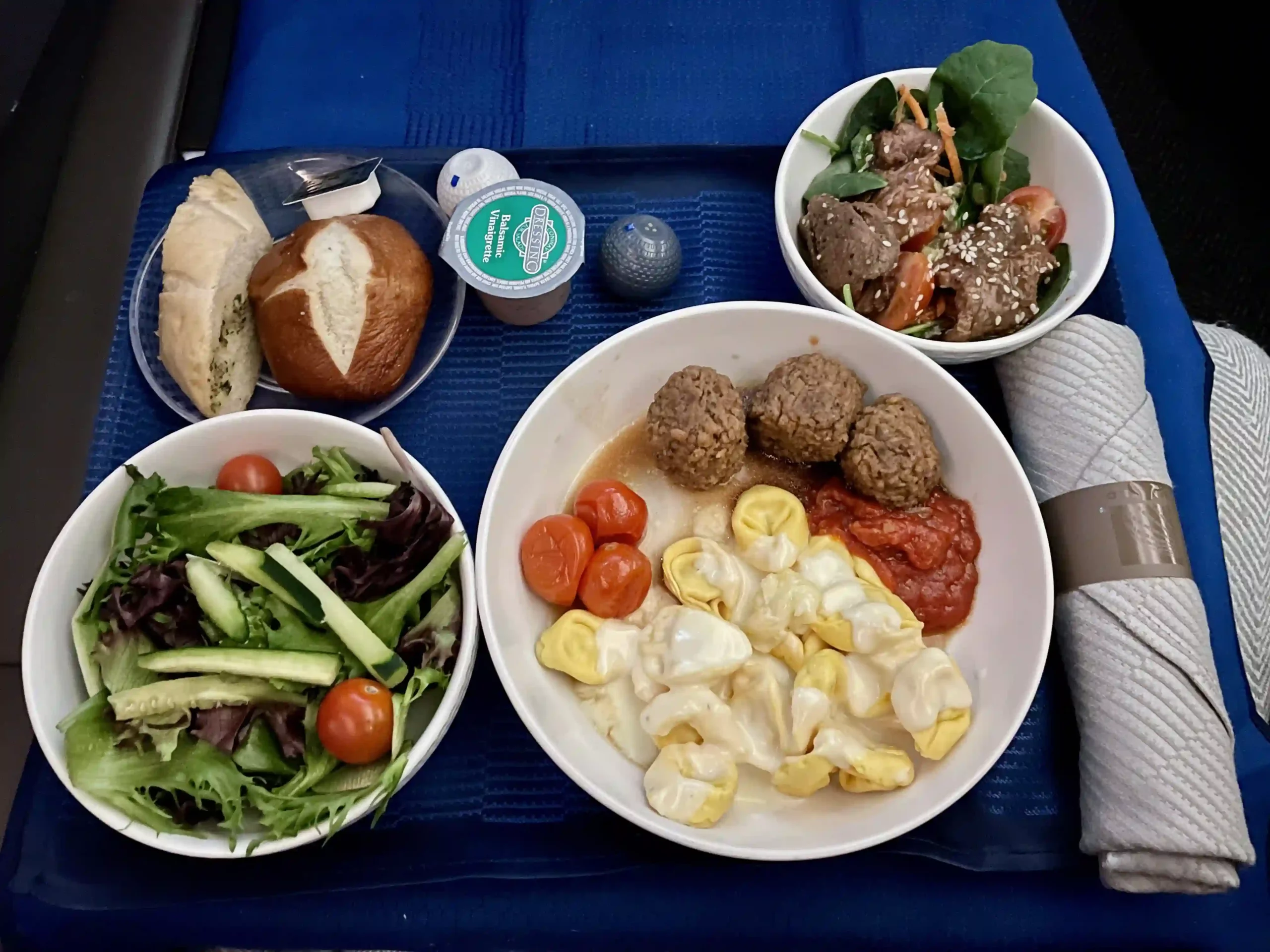 a plate of food on a blue surface