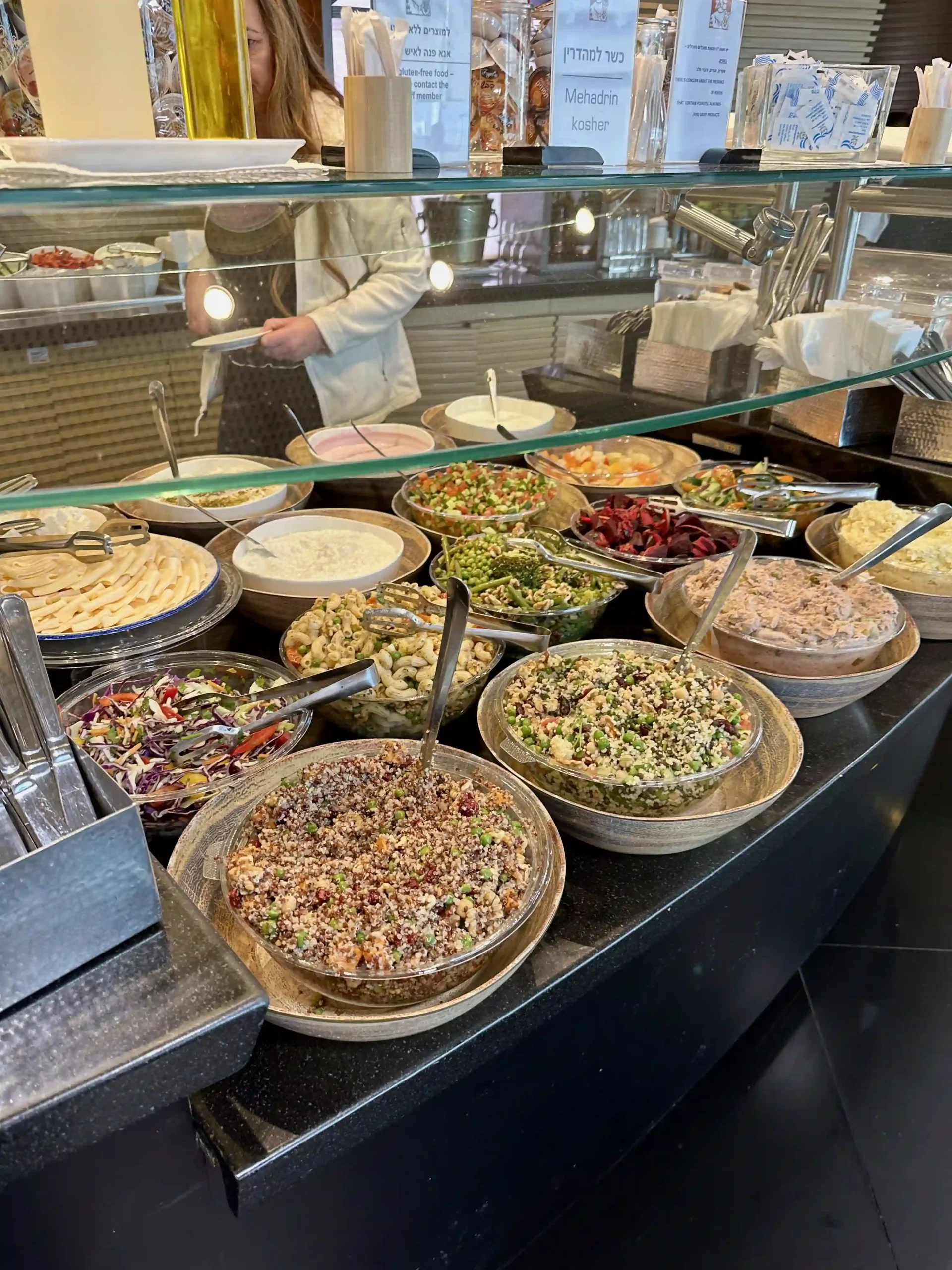 a buffet with bowls of food