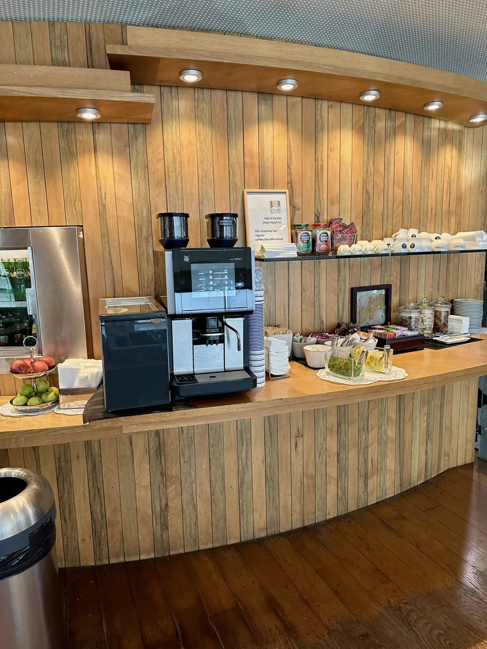 a kitchen with a wood wall and a counter top