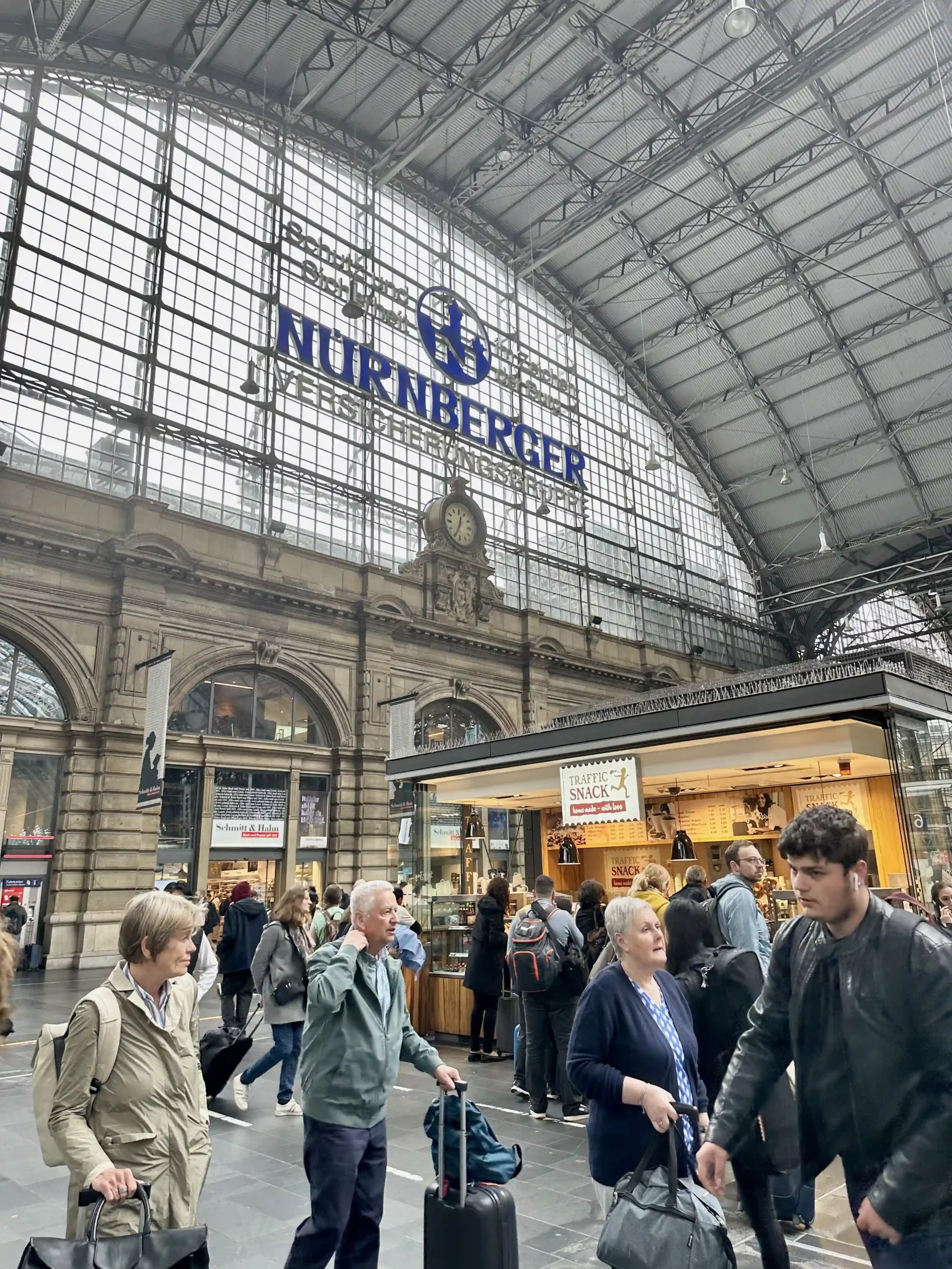 a group of people in a large building