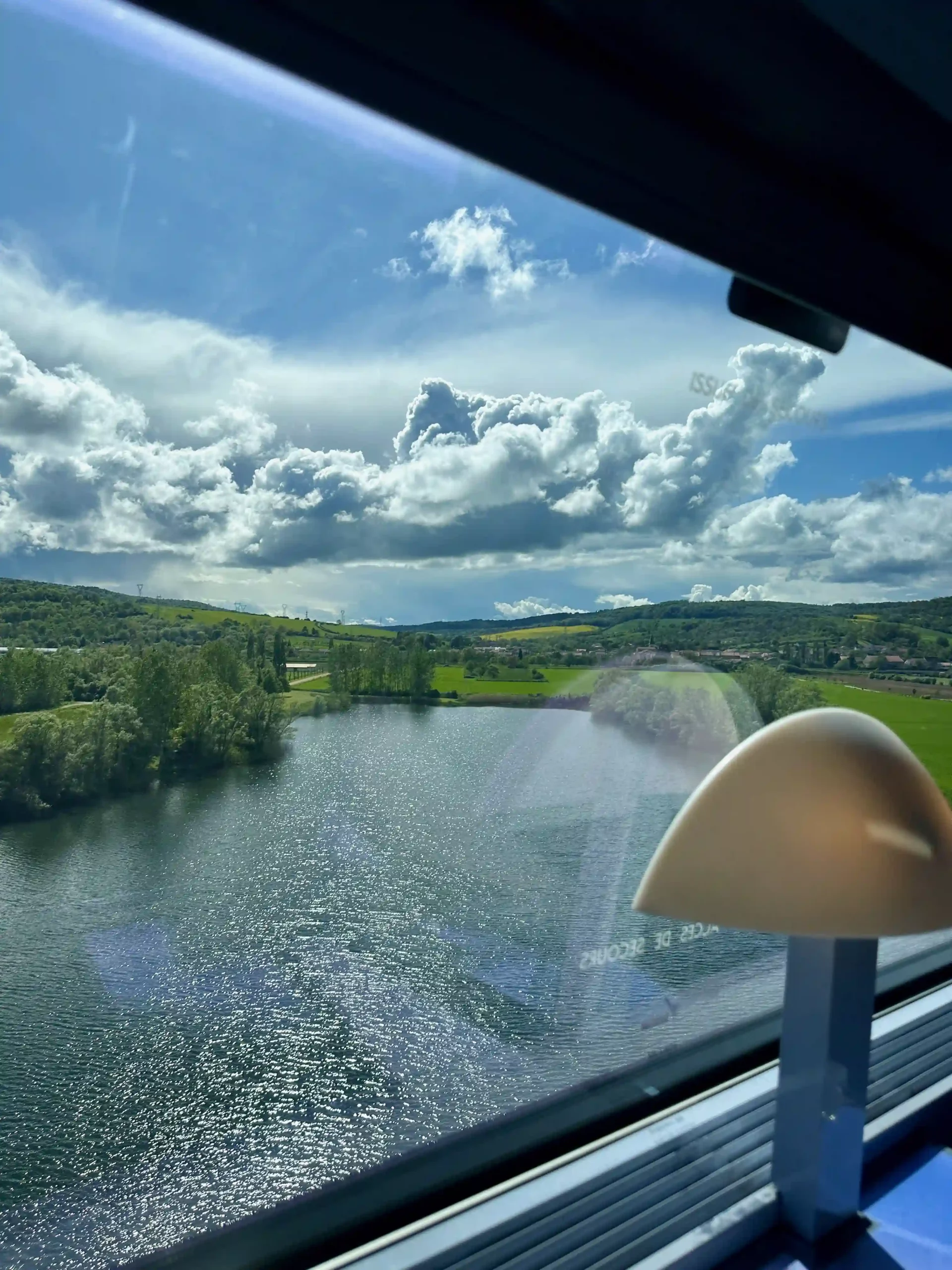 a view of a lake from a window