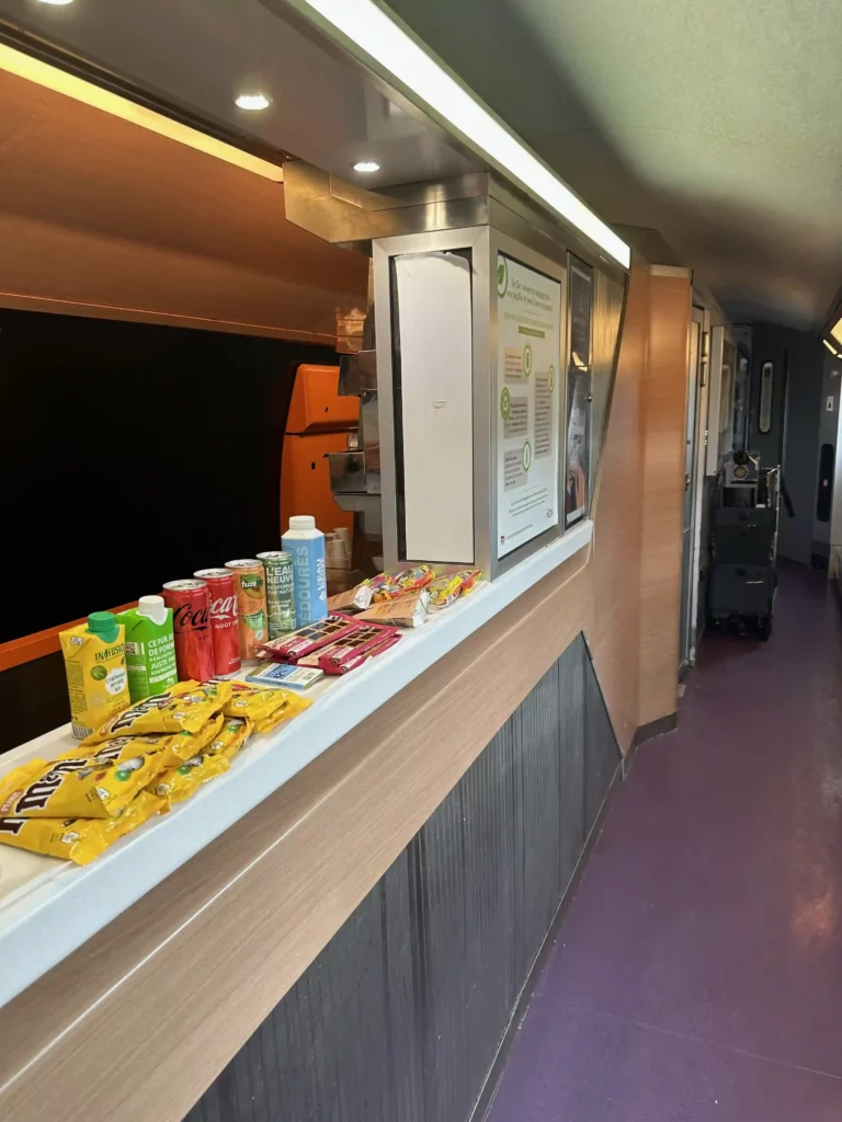 a counter with food and drinks on it