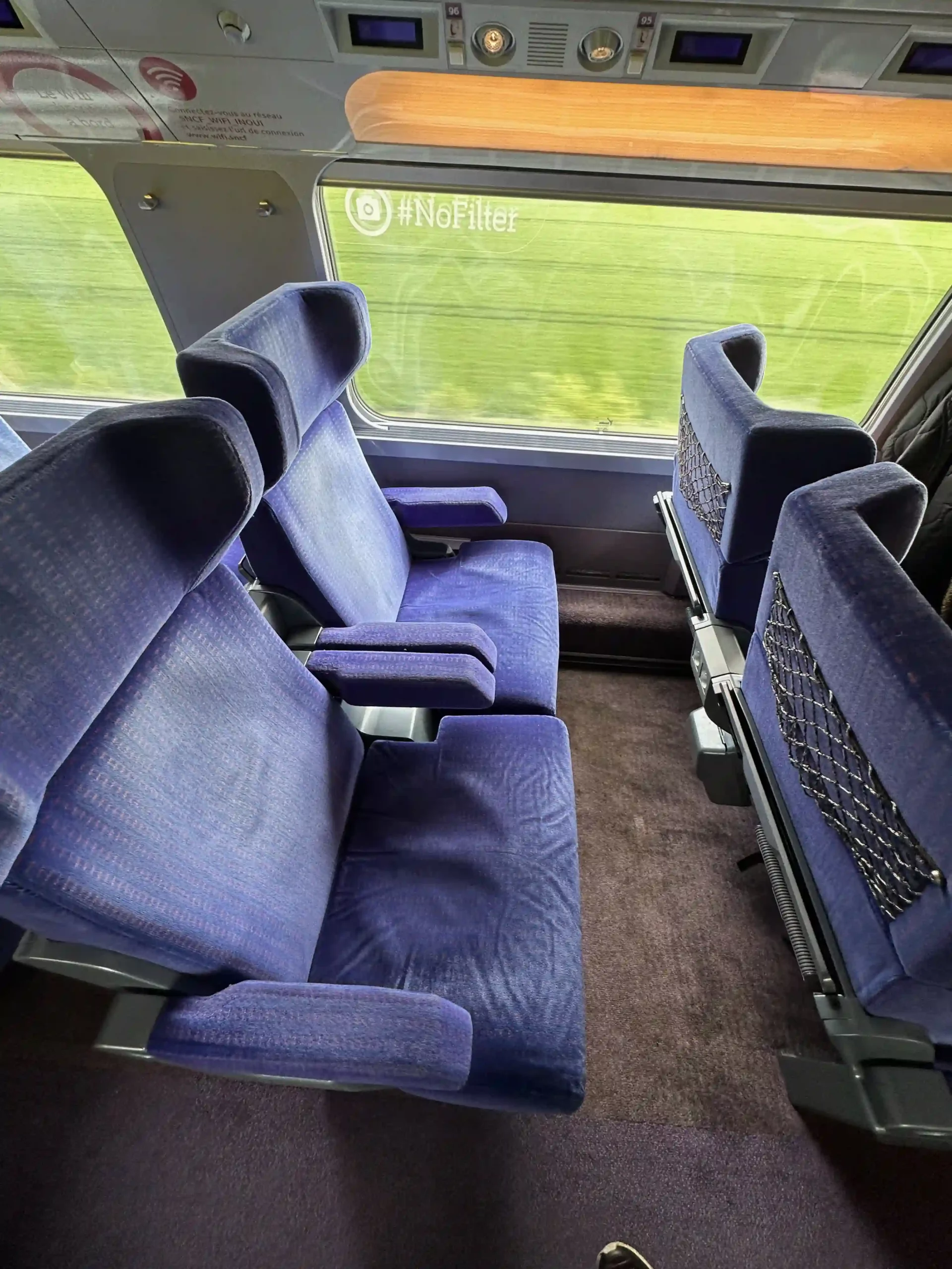 a blue seats in a train