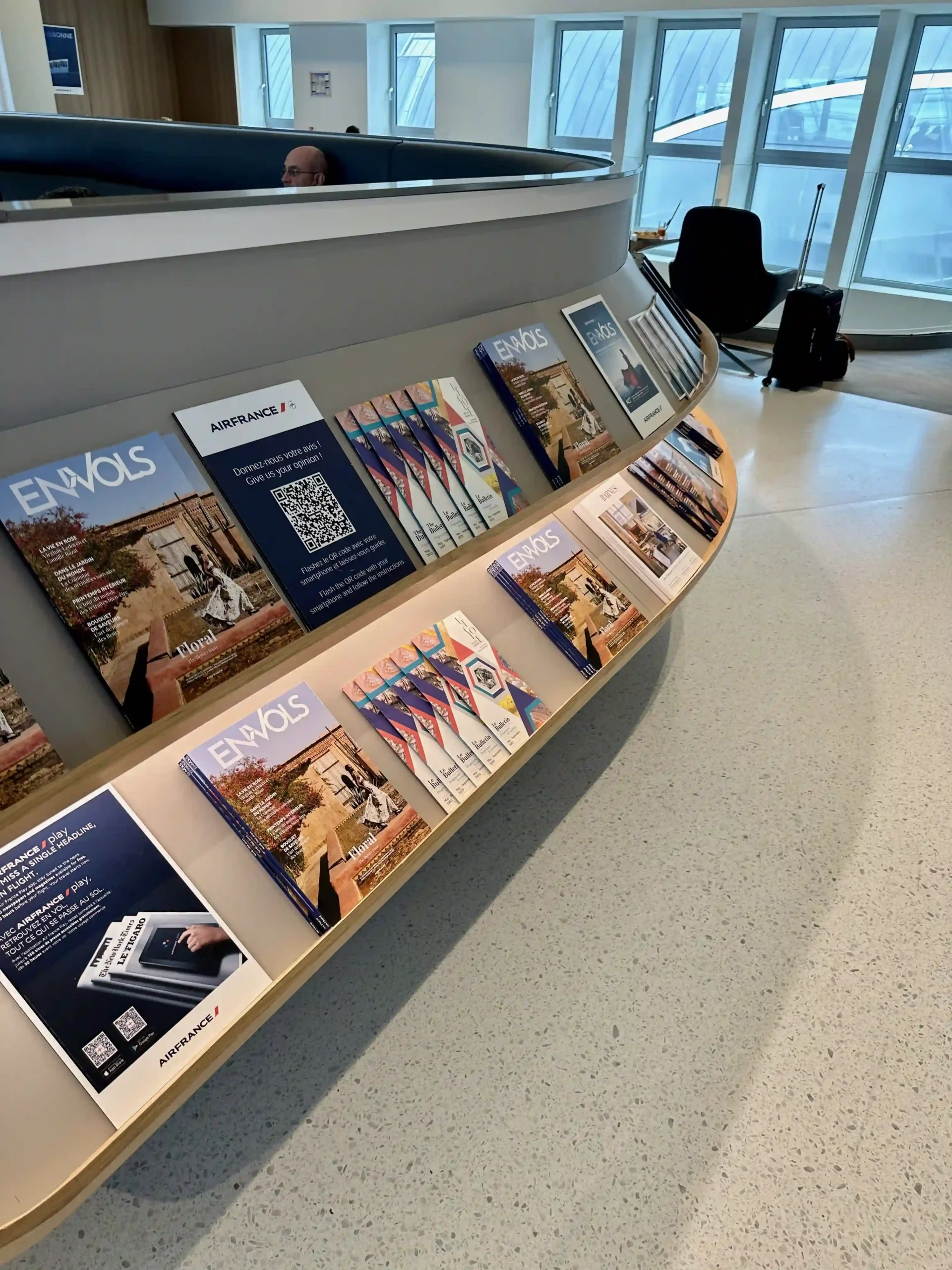 a display of magazines on a wall