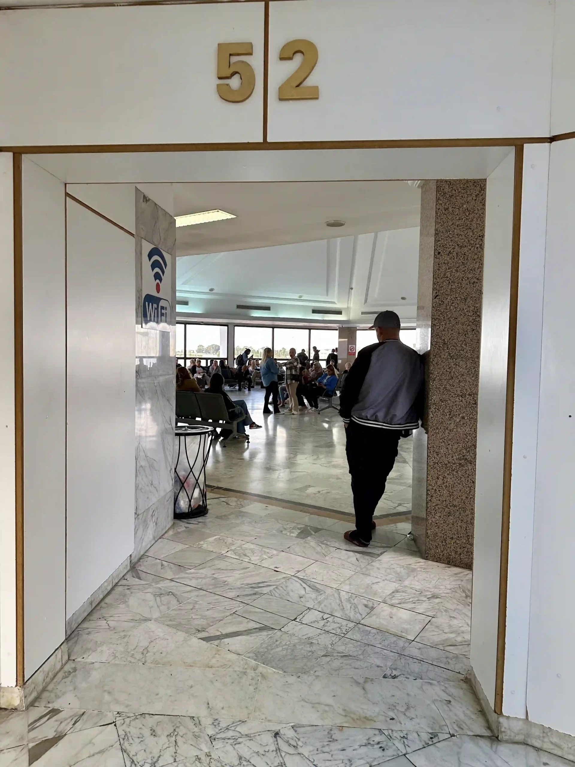 a man standing in a hallway