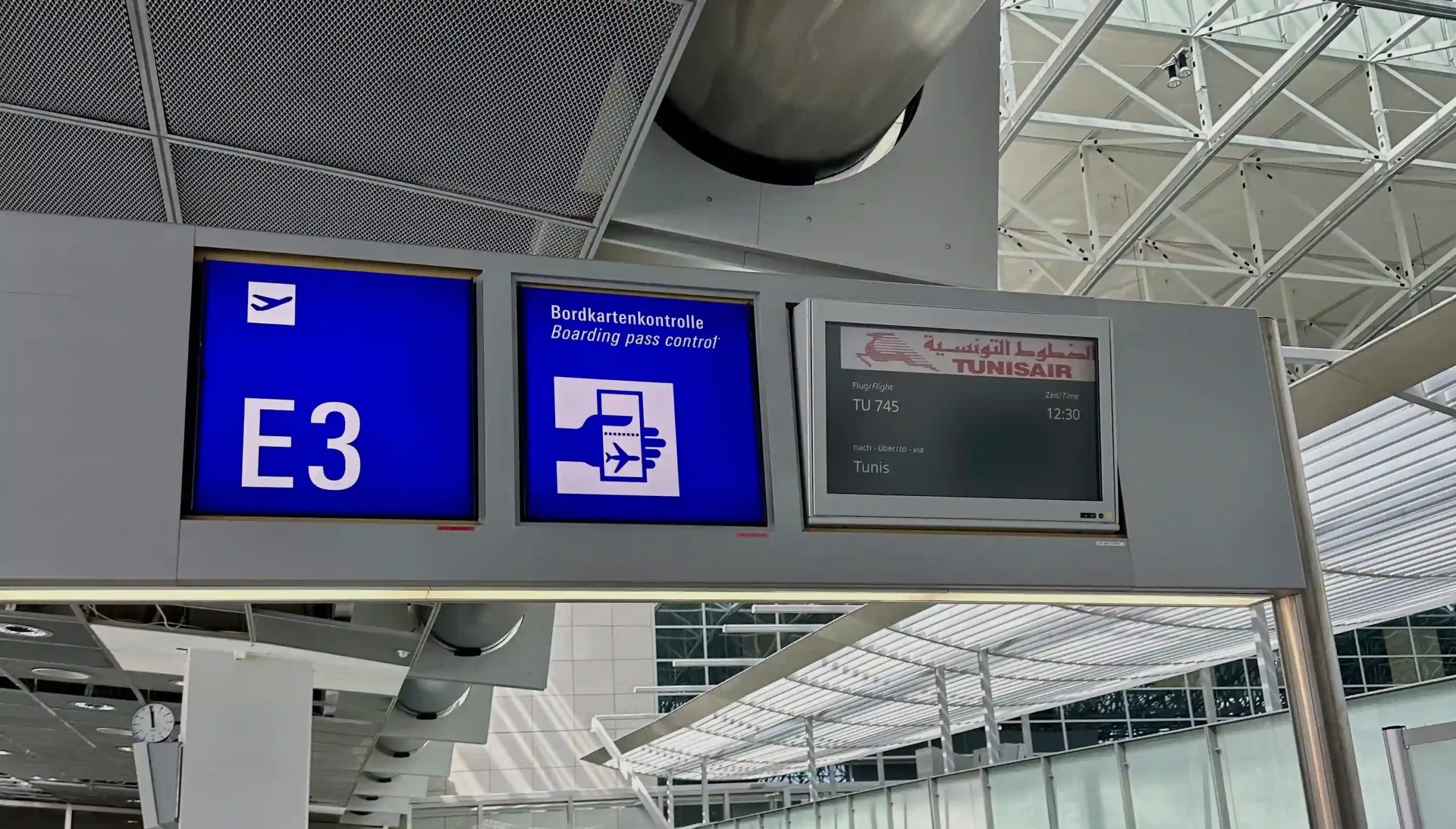 a sign board with a plane and a plane