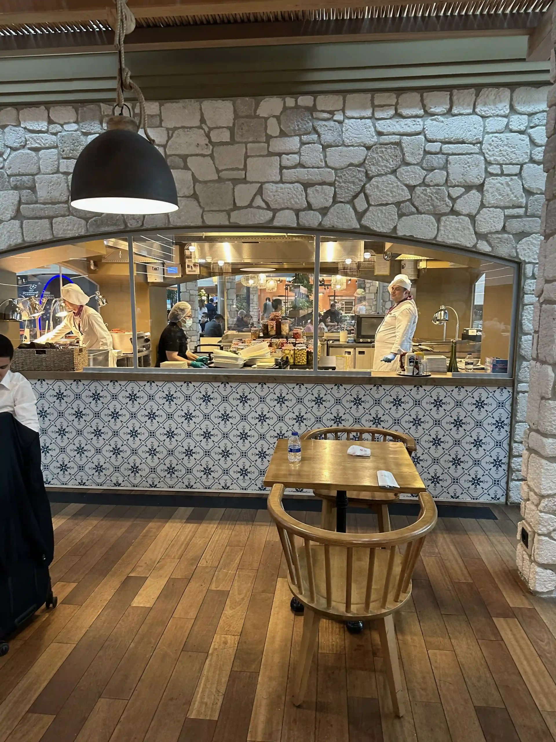 a man standing in front of a counter