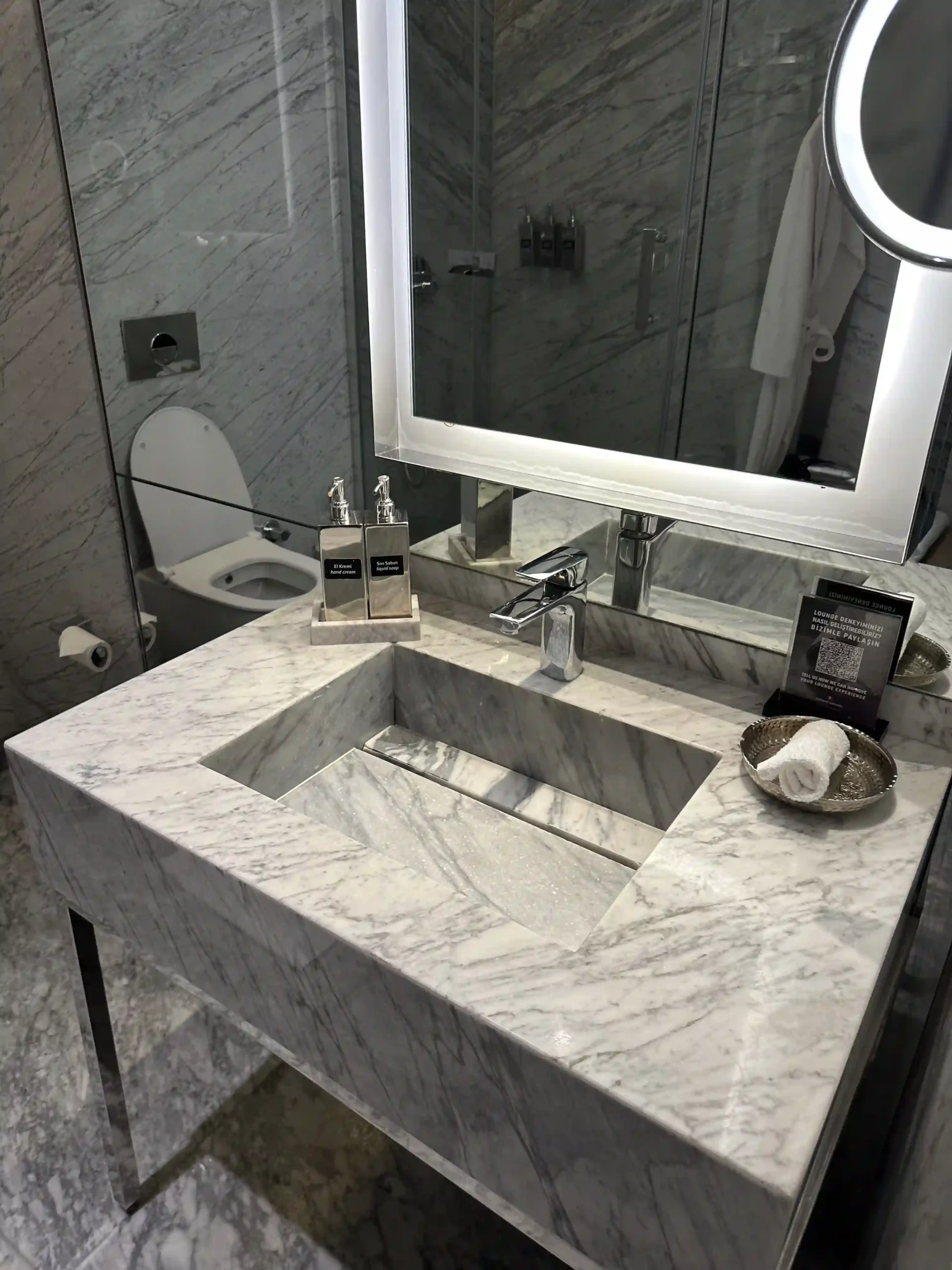 a bathroom sink with a mirror