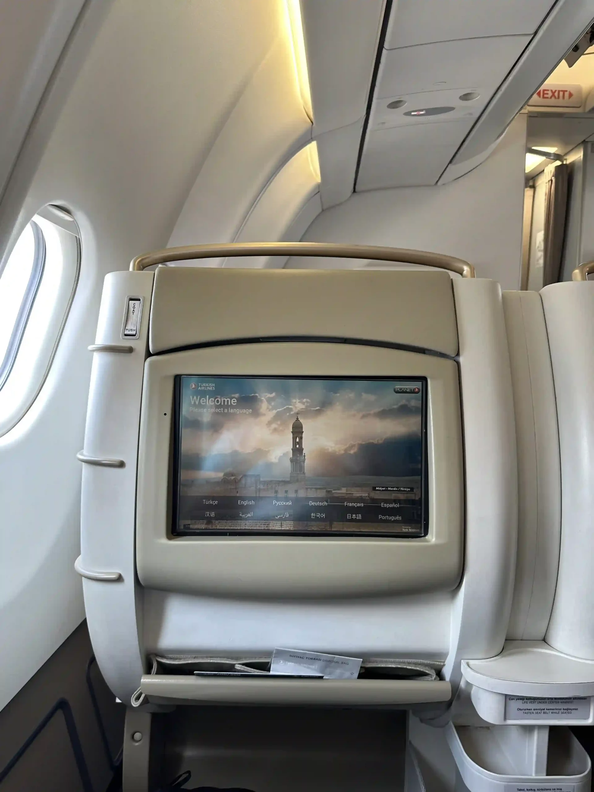 a screen on the back of an airplane