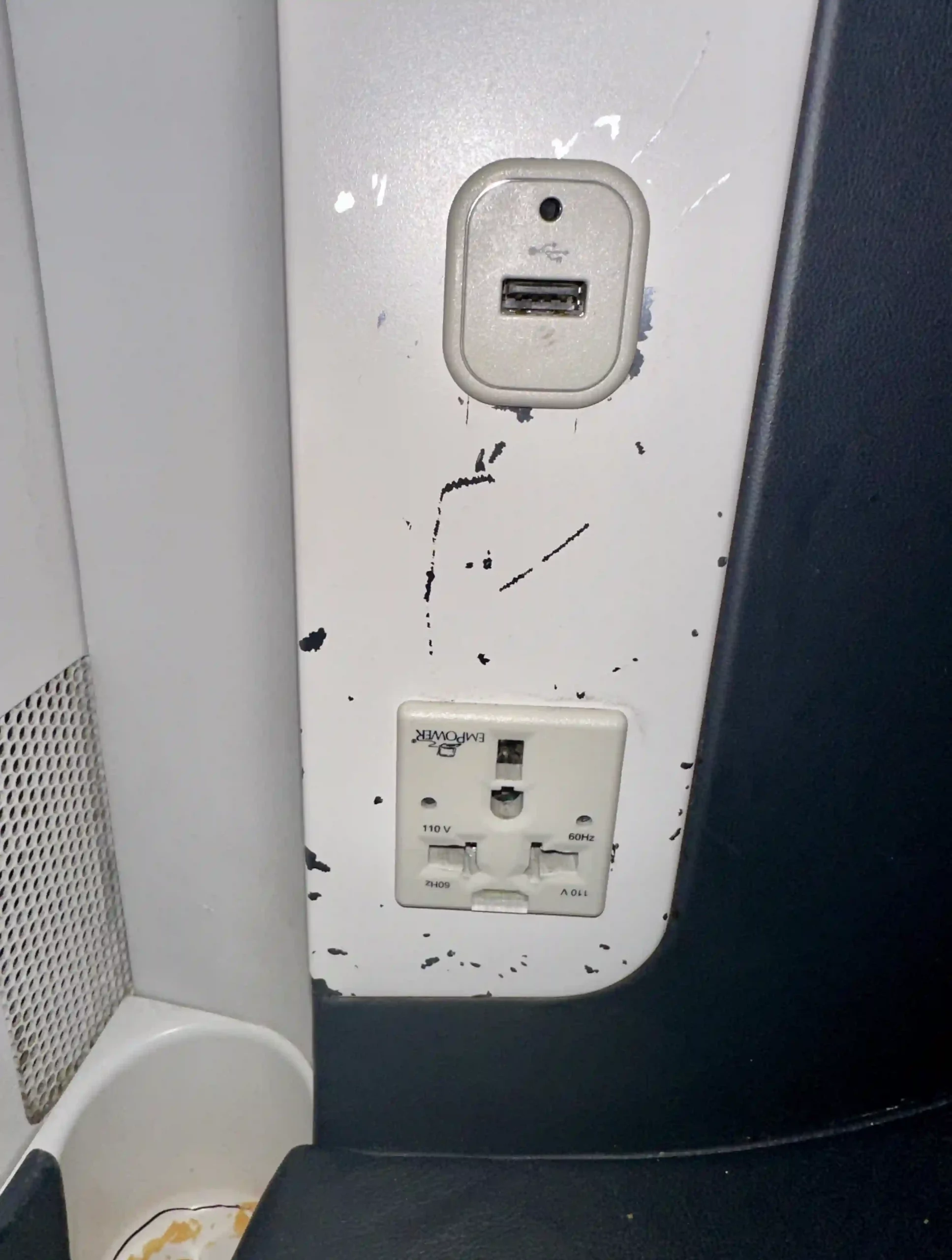 a white wall outlet with a usb port