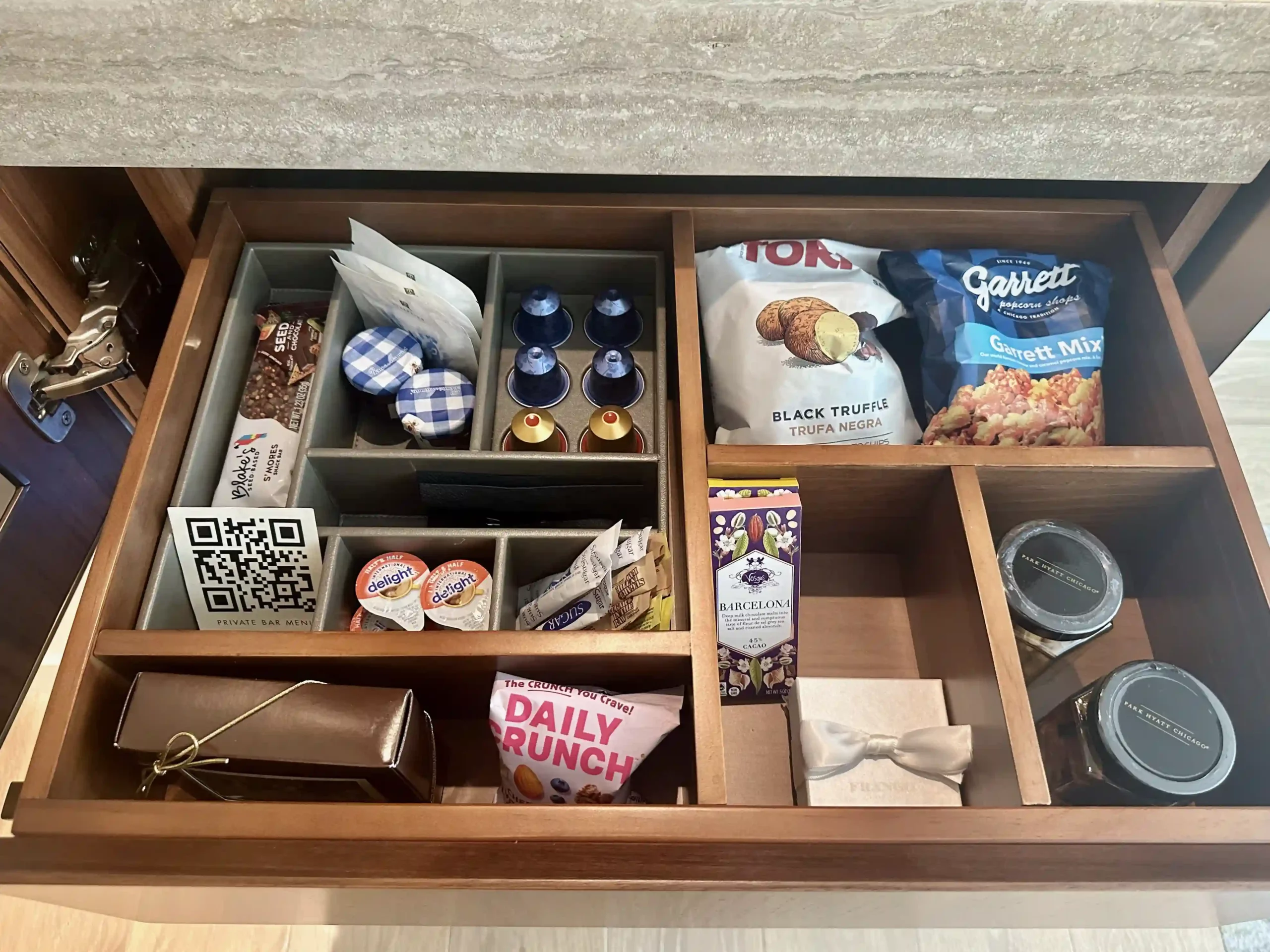a drawer with food items inside