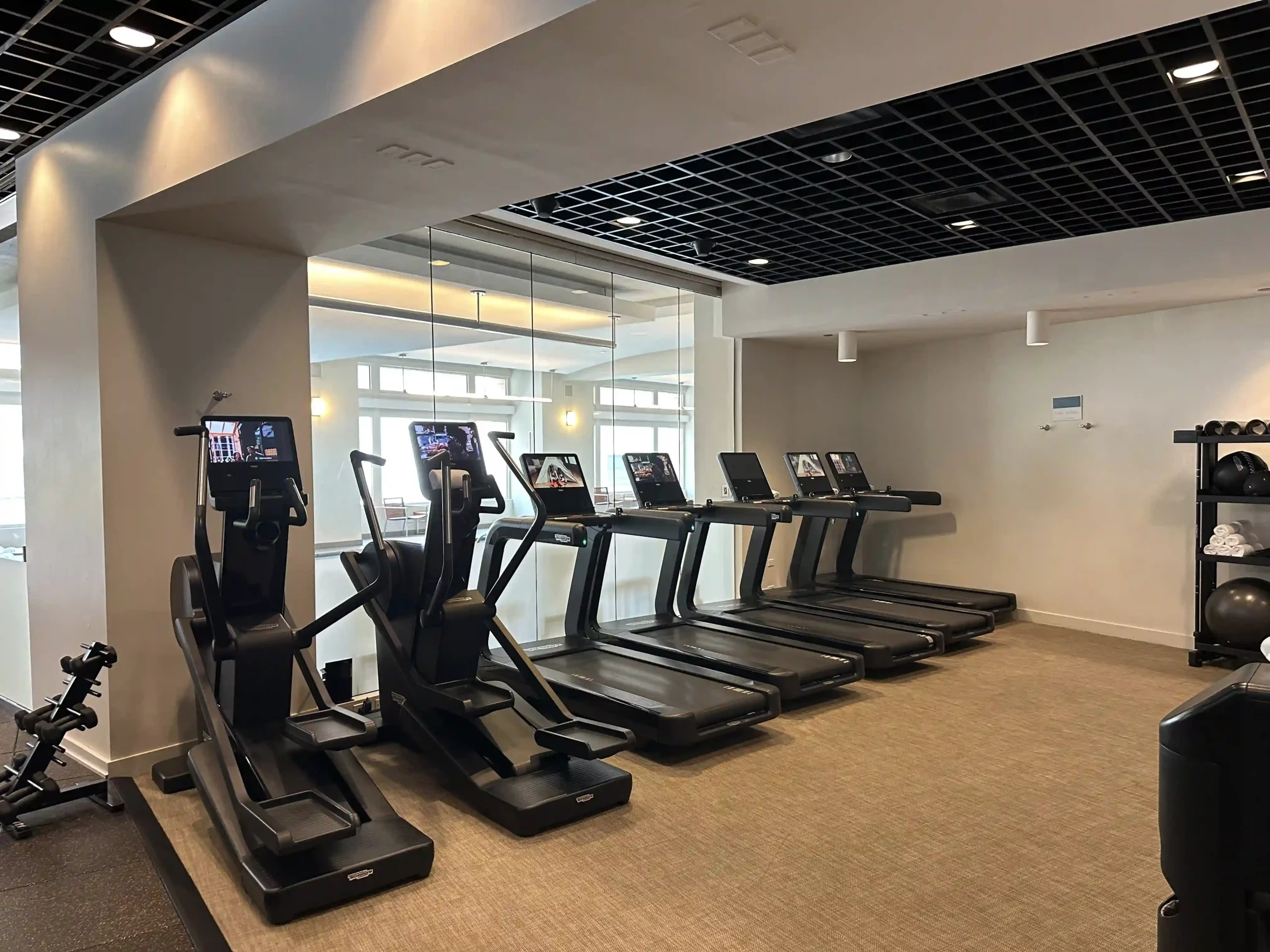 a group of treadmills in a gym