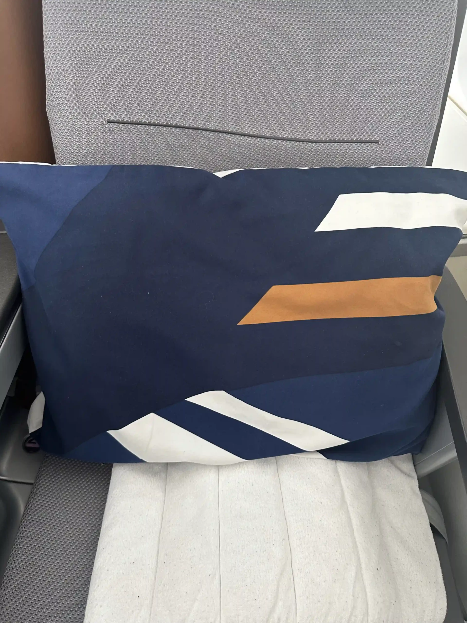 a pillow on a seat