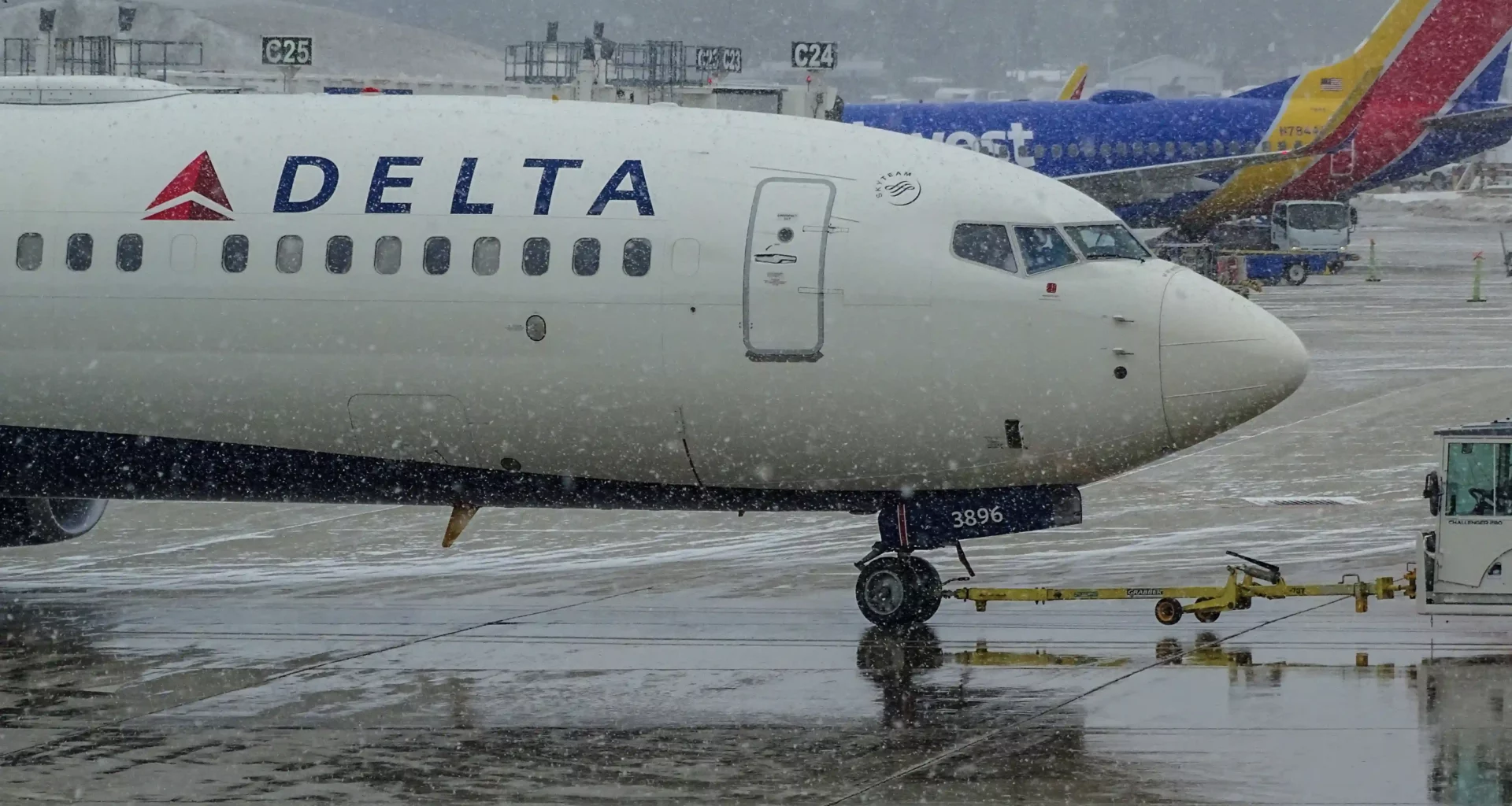 Delta plane on tarmac in snow