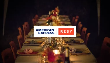 American Express and Resy logos on top of laid table