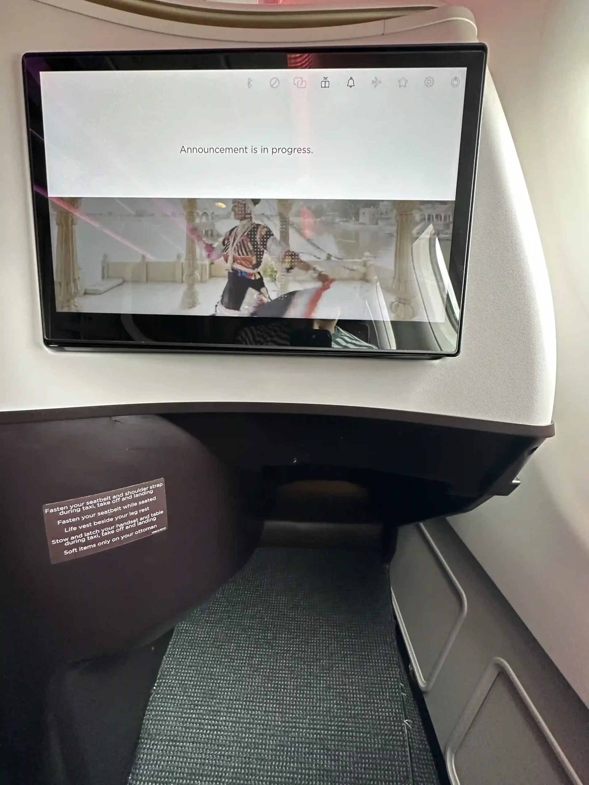 a tv on the back of an airplane