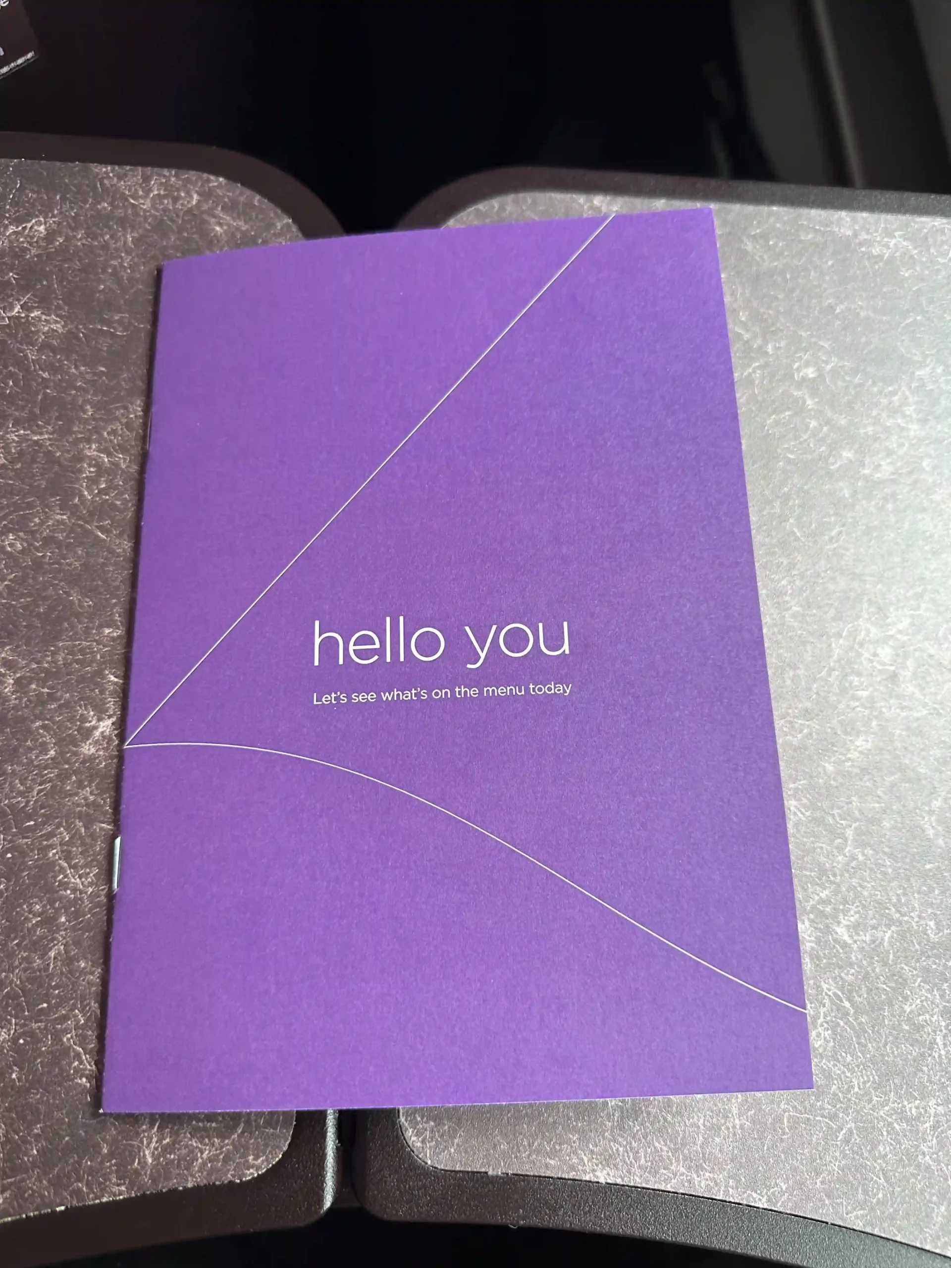 a purple card on a table