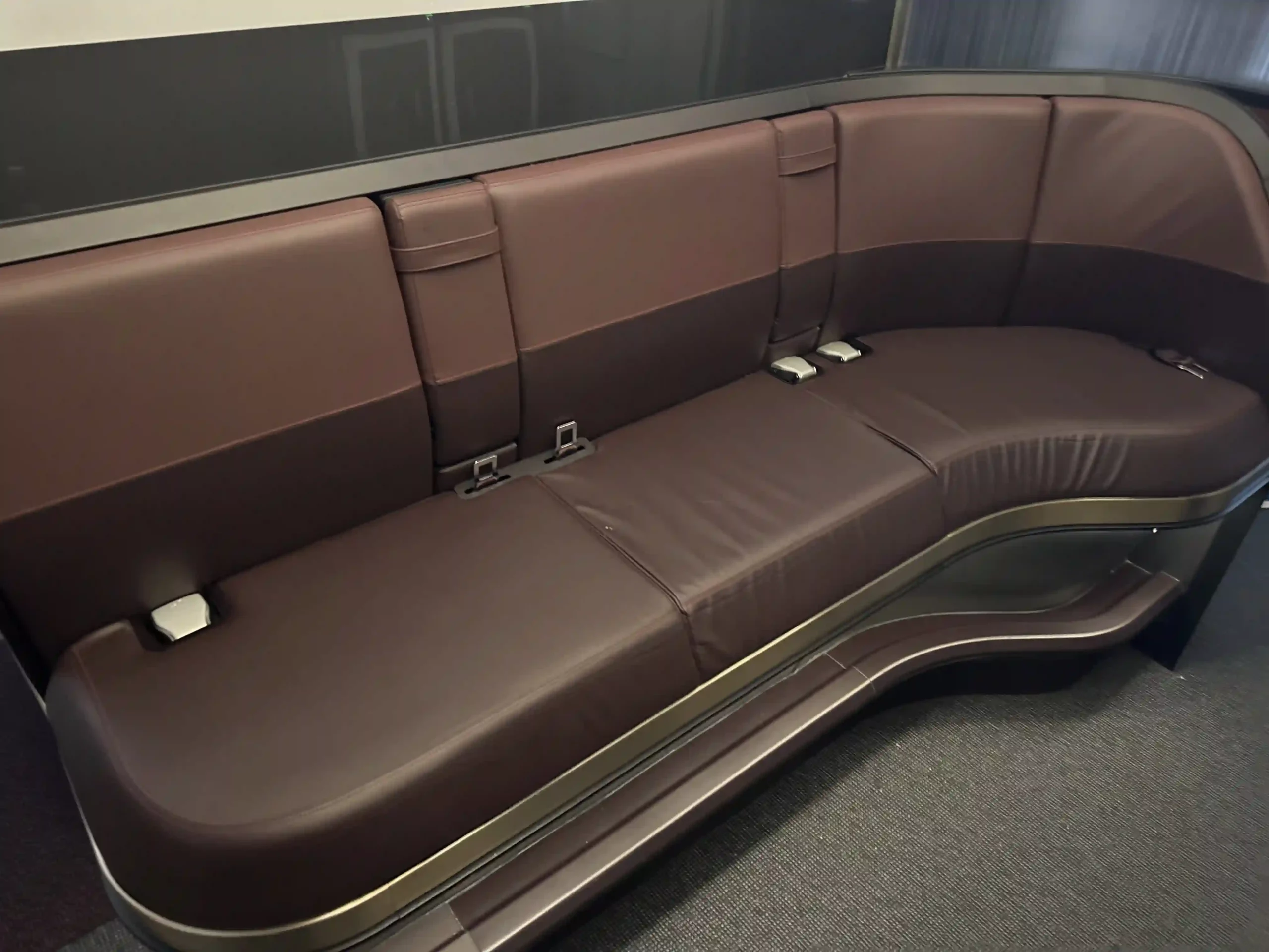 a brown leather couch in a room